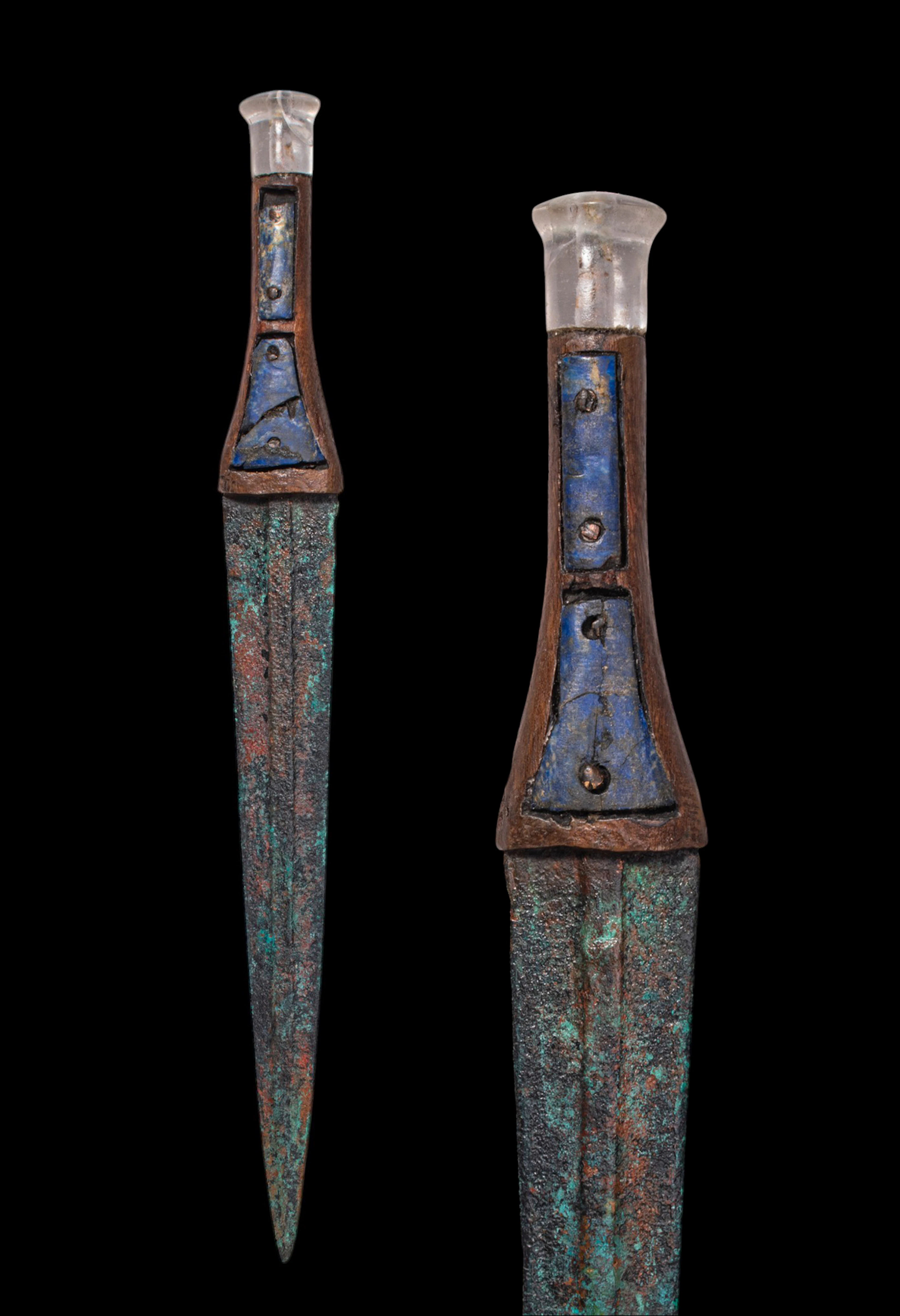 EGYPTIAN BRONZE DAGGER WITH ROCK CRYSTAL POMMEL AND LAPIS LAZULI-INLAID GRIP