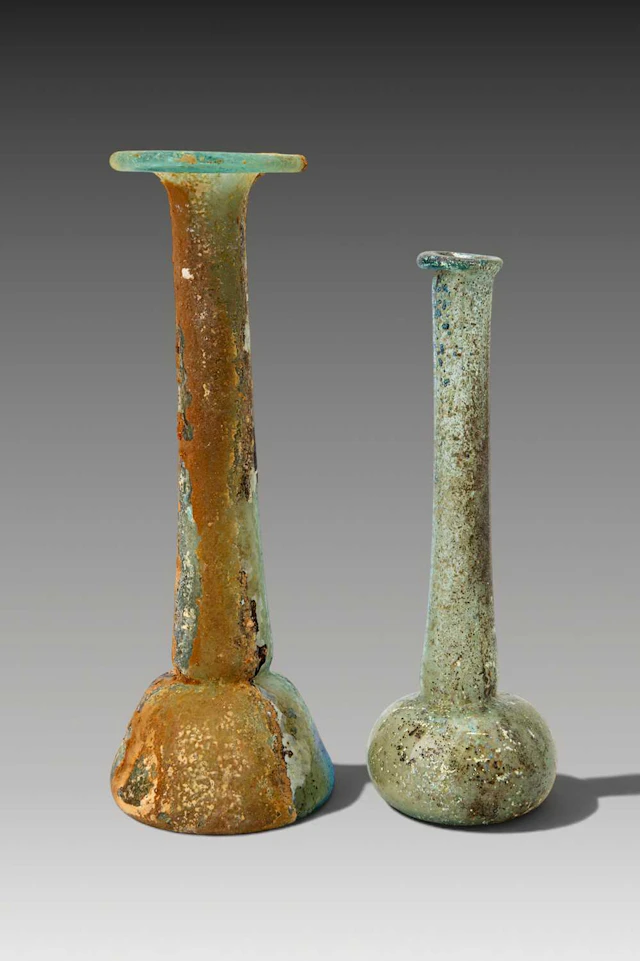 PAIR OF ROMAN GLASS TALL UNGUENTARIA