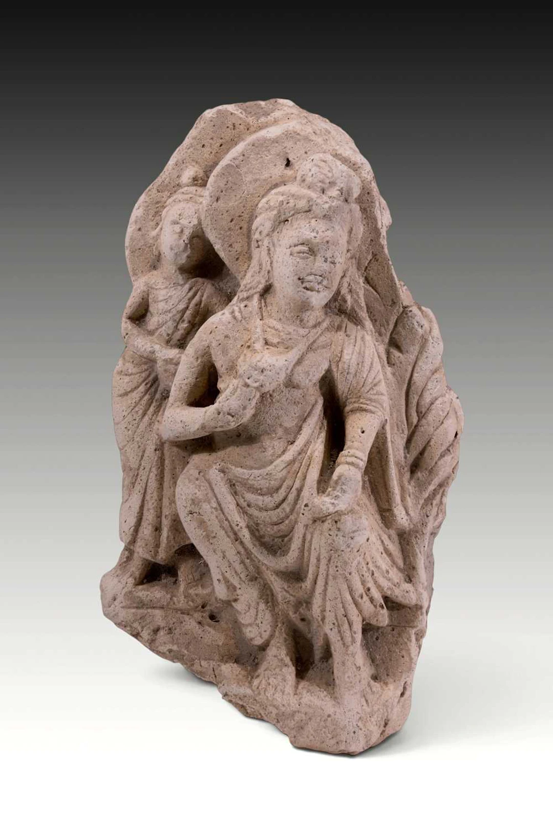 GANDHARA STUCCO RELIEF OF BUDDHA WITH A WORSHIPPER