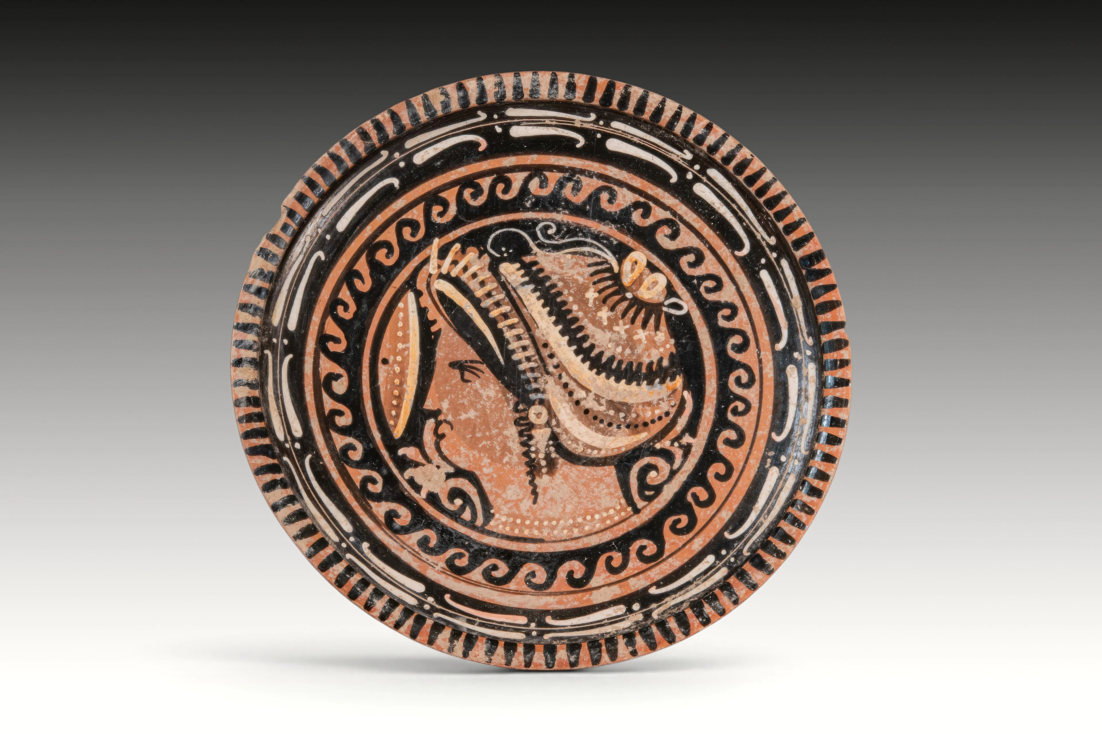 APULIAN TERRACOTTA PLATE WITH LADY OF FASHION BY THE M. B. CENTAUR GROUP