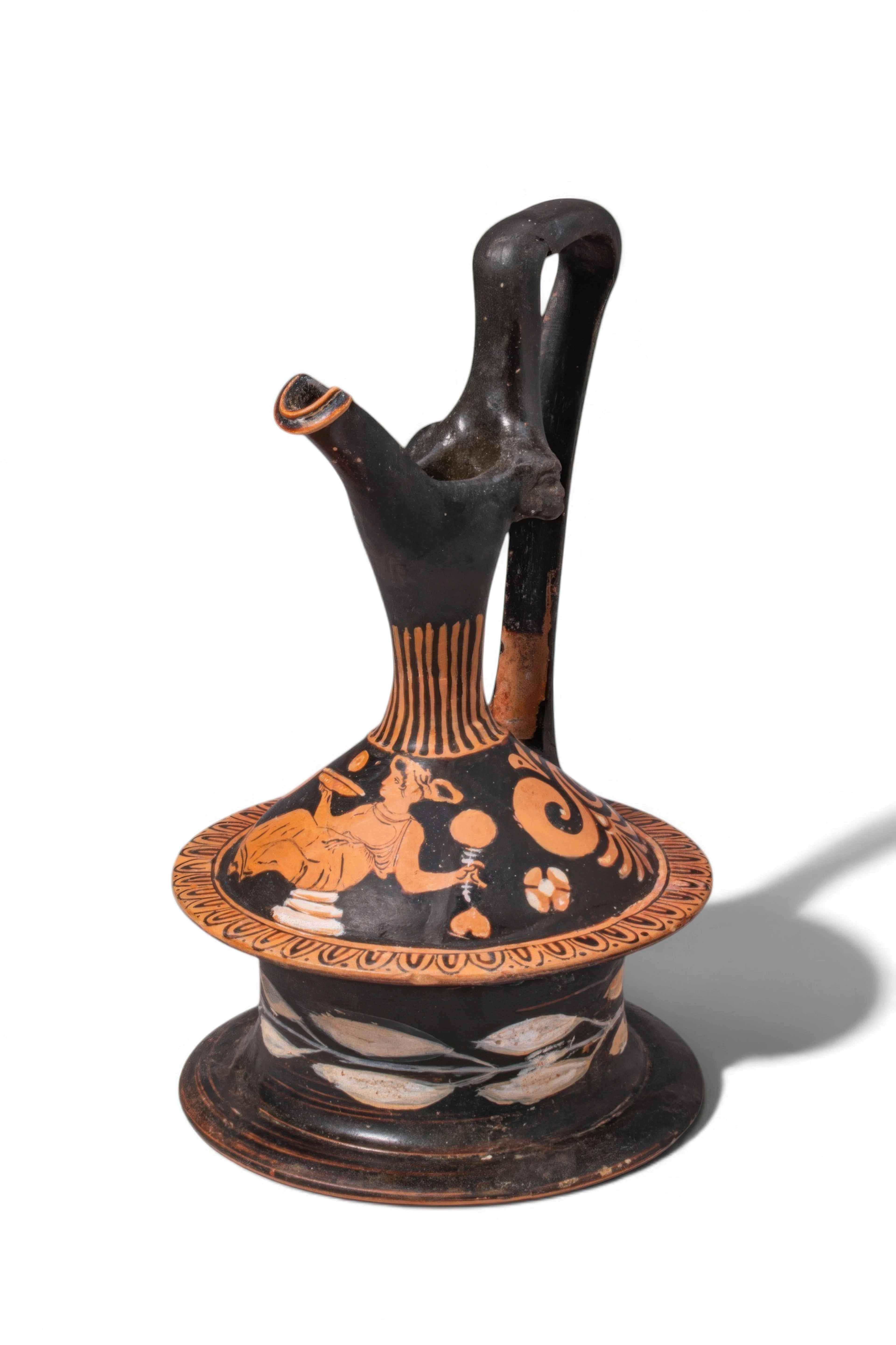 APULIAN RED-FIGURE EPICHYSIS WITH A SEATED MAENAD