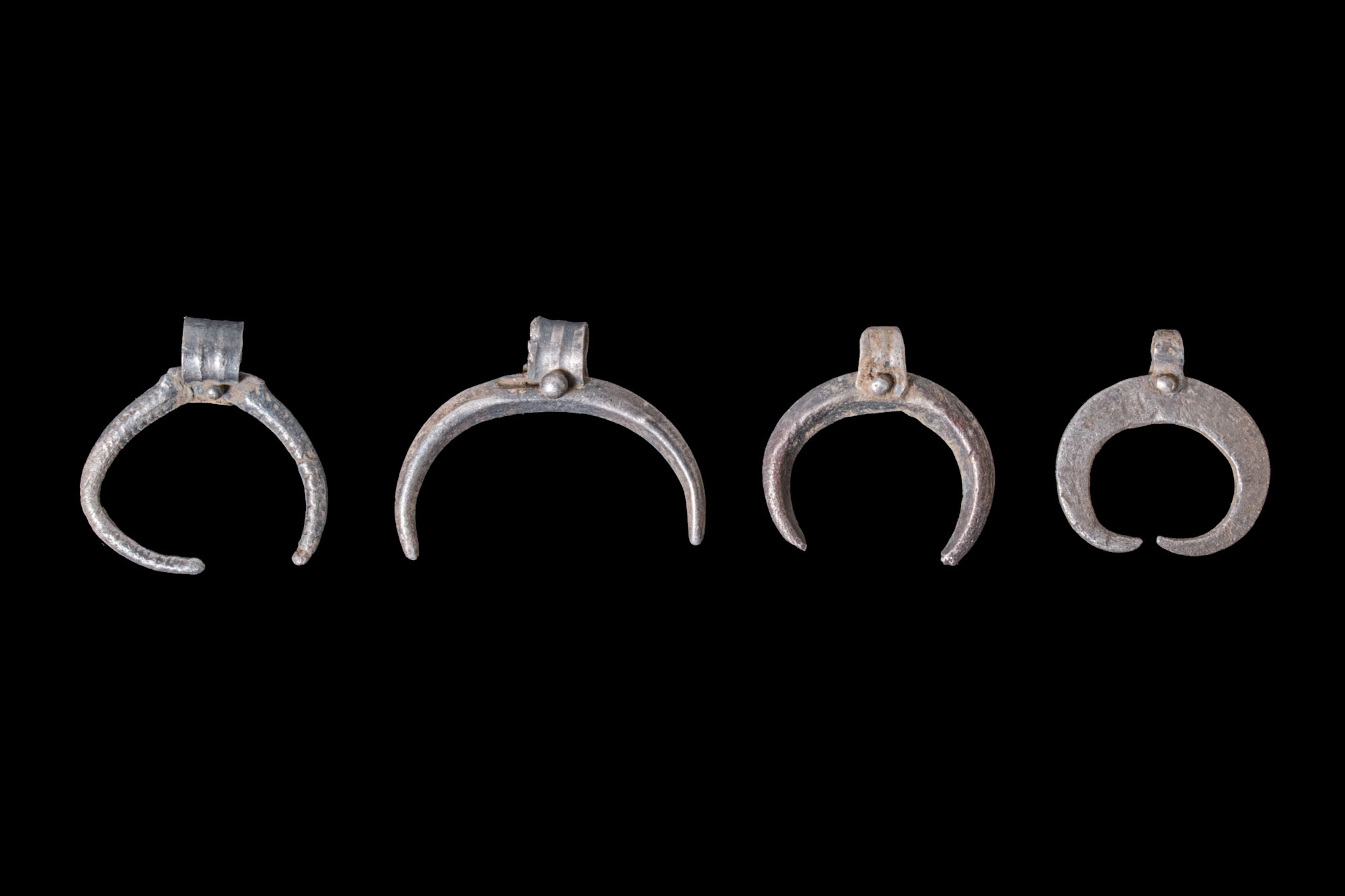 COLLECTION OF GRAECO-ROMAN SILVER LUNULA PENDANTS