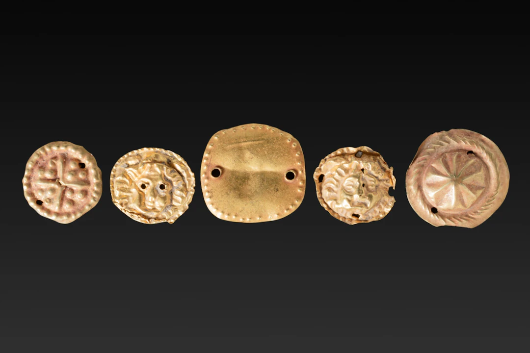 COLLECTION OF GREEK HIGH KARAT GOLD APPLIQUÉS