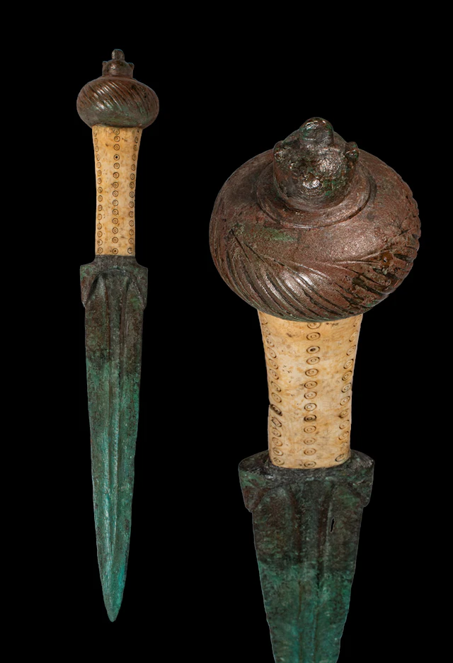 RARE BRONZE AGE BRONZE AND BONE DAGGER WITH DECORATED HANDLE