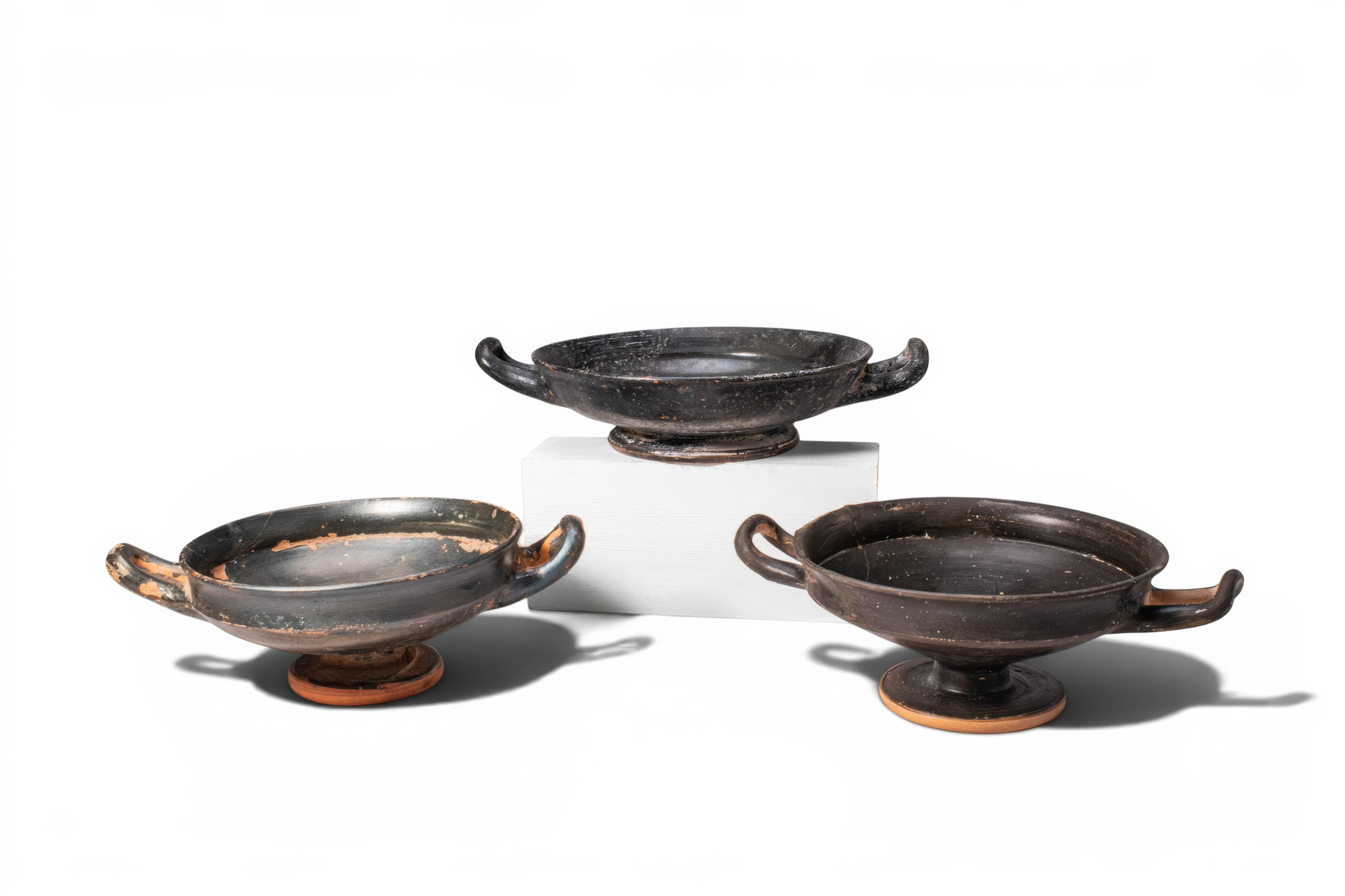 COLLECTION OF GREEK BLACK-GLAZED KYLIXES