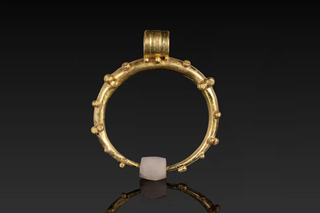 HELLENISTIC GOLD CRESCENT PENDANT WITH GOLD PELLETS