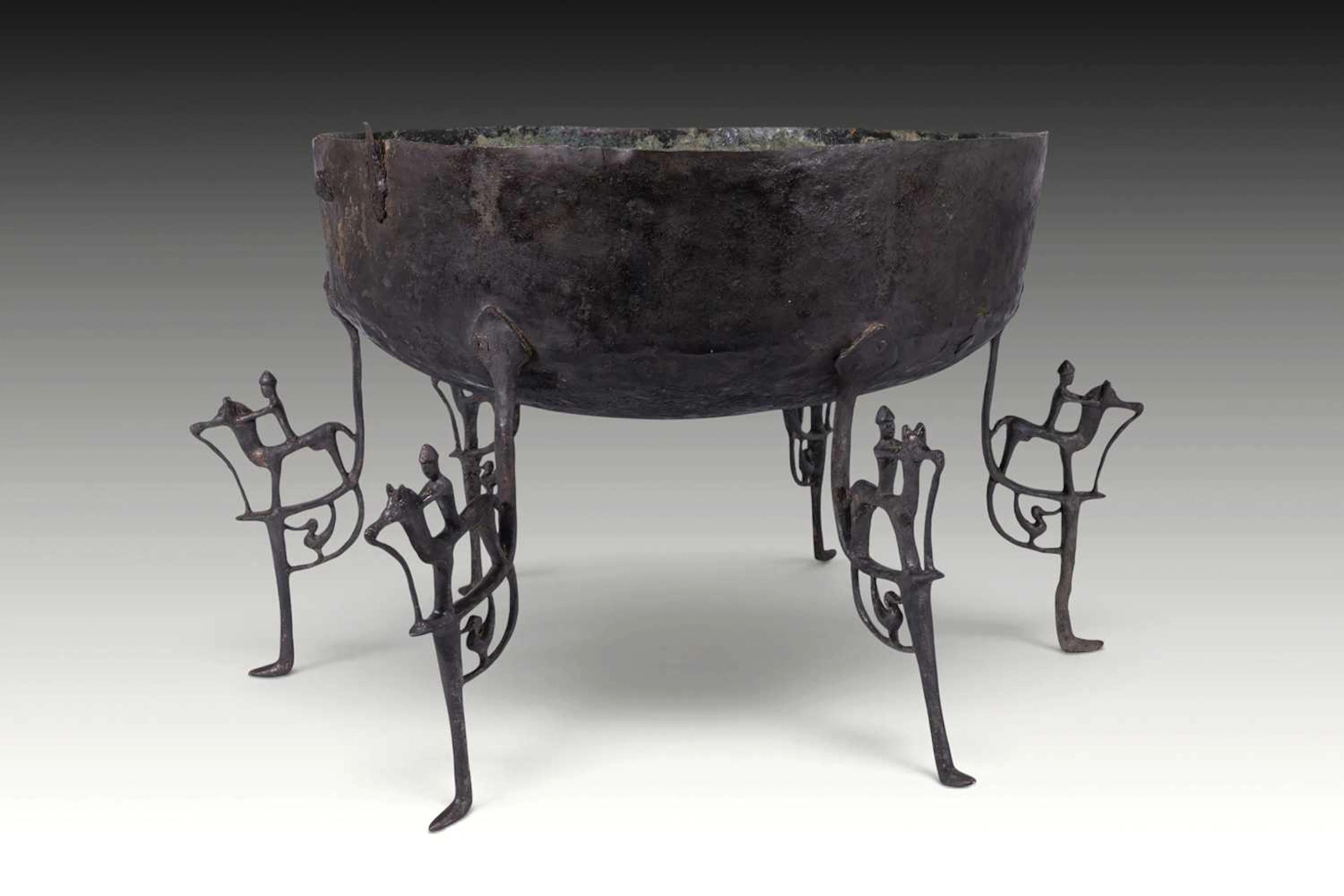 LATE VILLANOVAN AND ETRUSCAN BRONZE BASIN WITH FIGURAL LEGS