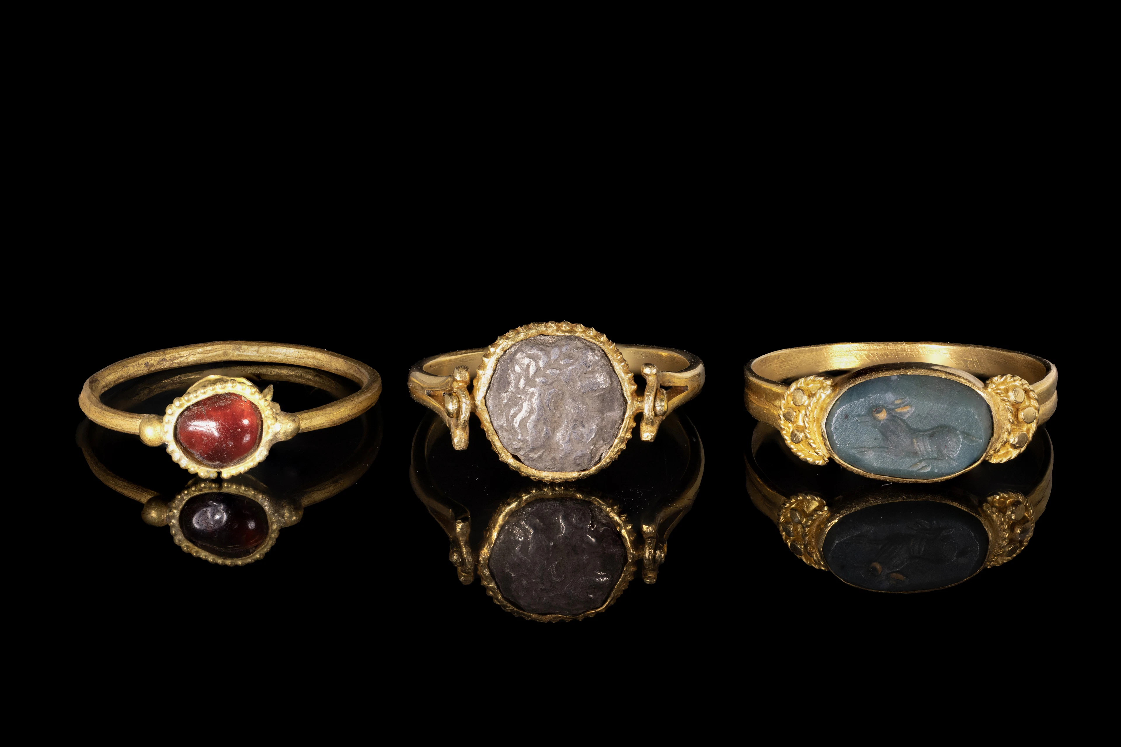 COLLECTION OF ROMAN AND SASSANIAN GOLD RINGS
