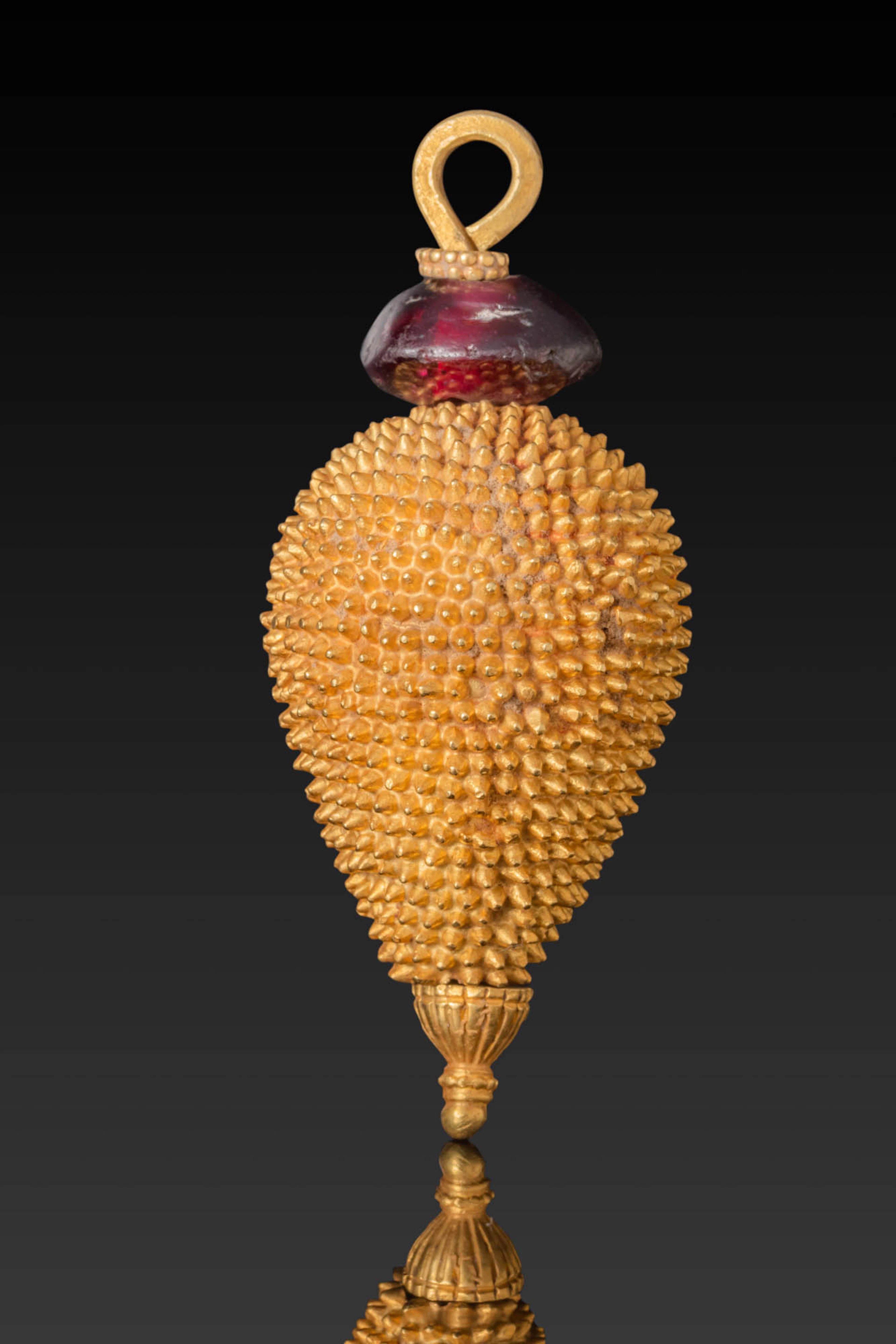 GREEK HIGH KARAT GOLD EARRING WITH GARNET BEAD