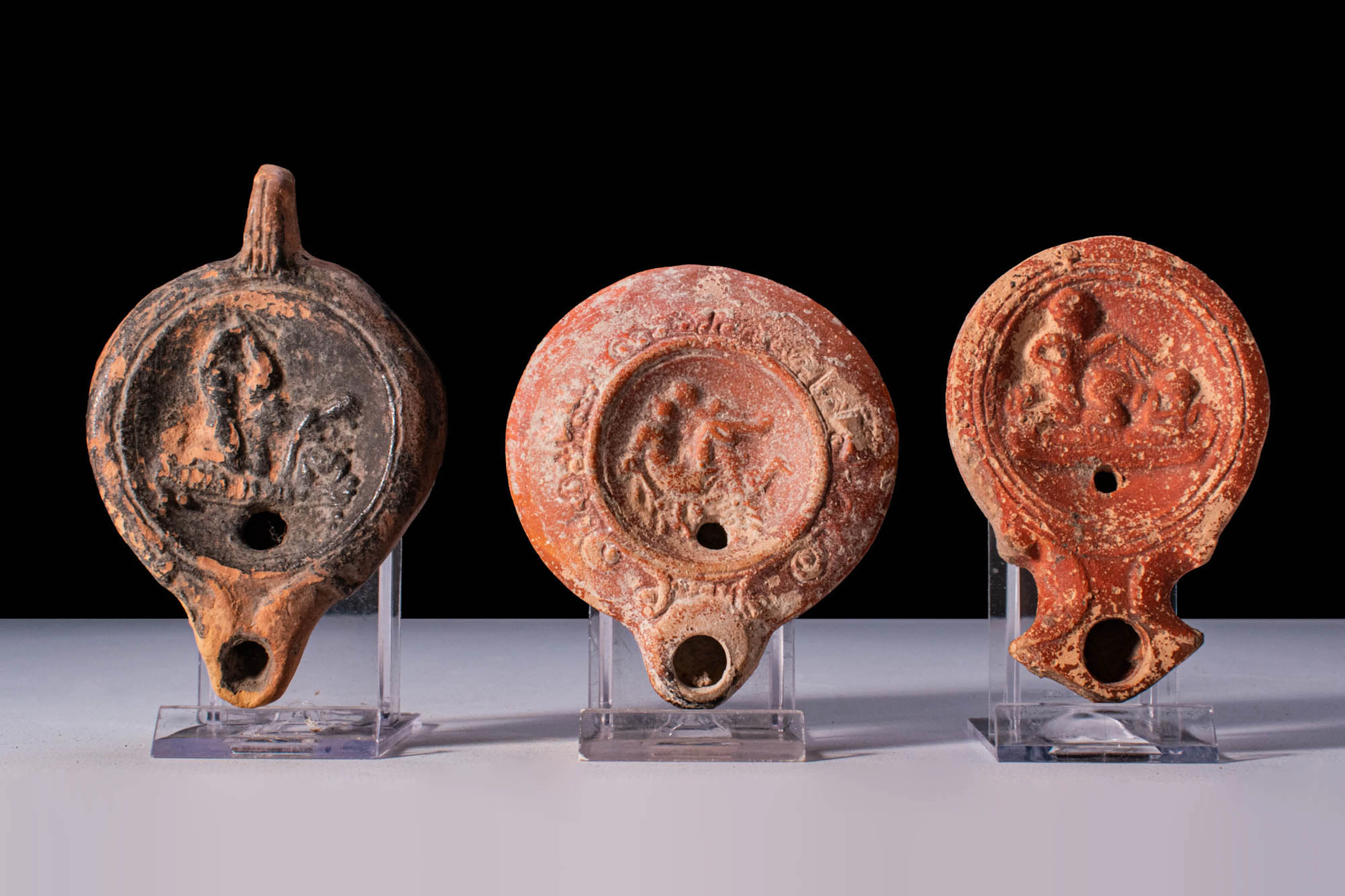 COLLECTION OF ROMAN TERRACOTTA OIL LAMPS WITH EROTIC SCENES