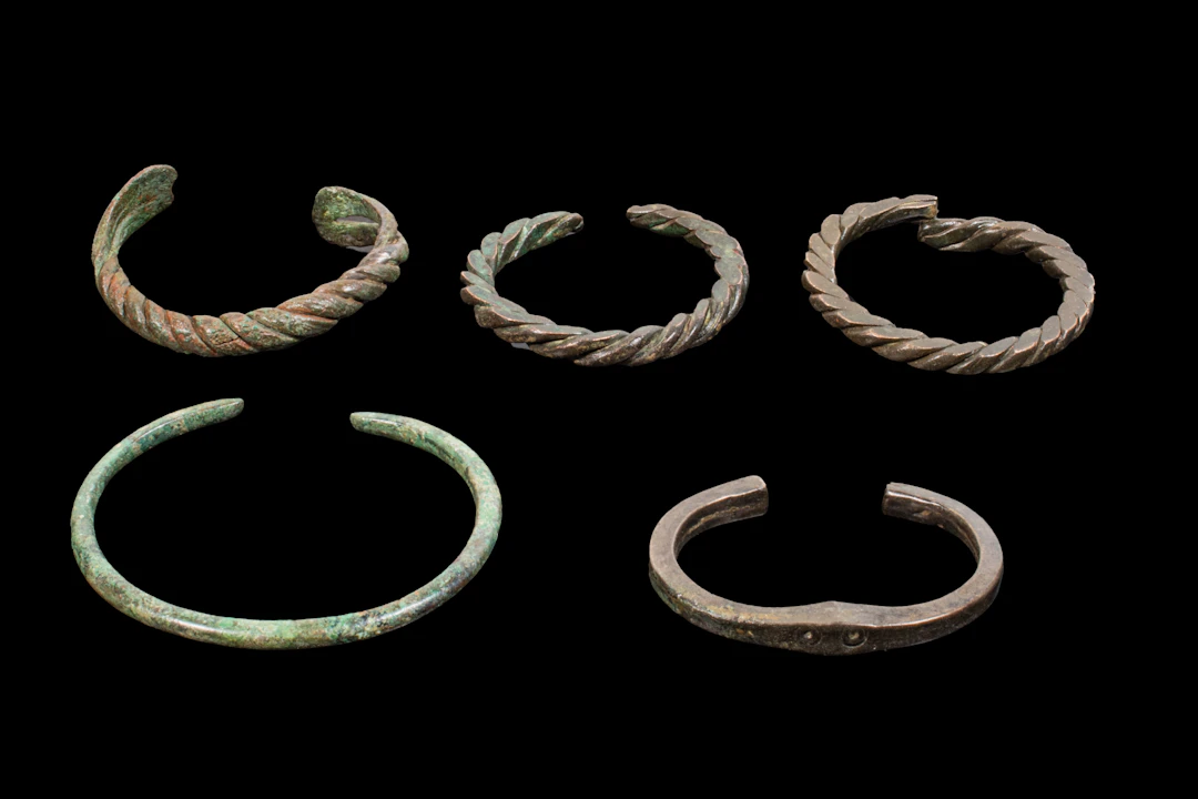 COLLECTION OF CELTIC BRONZE BANGLES