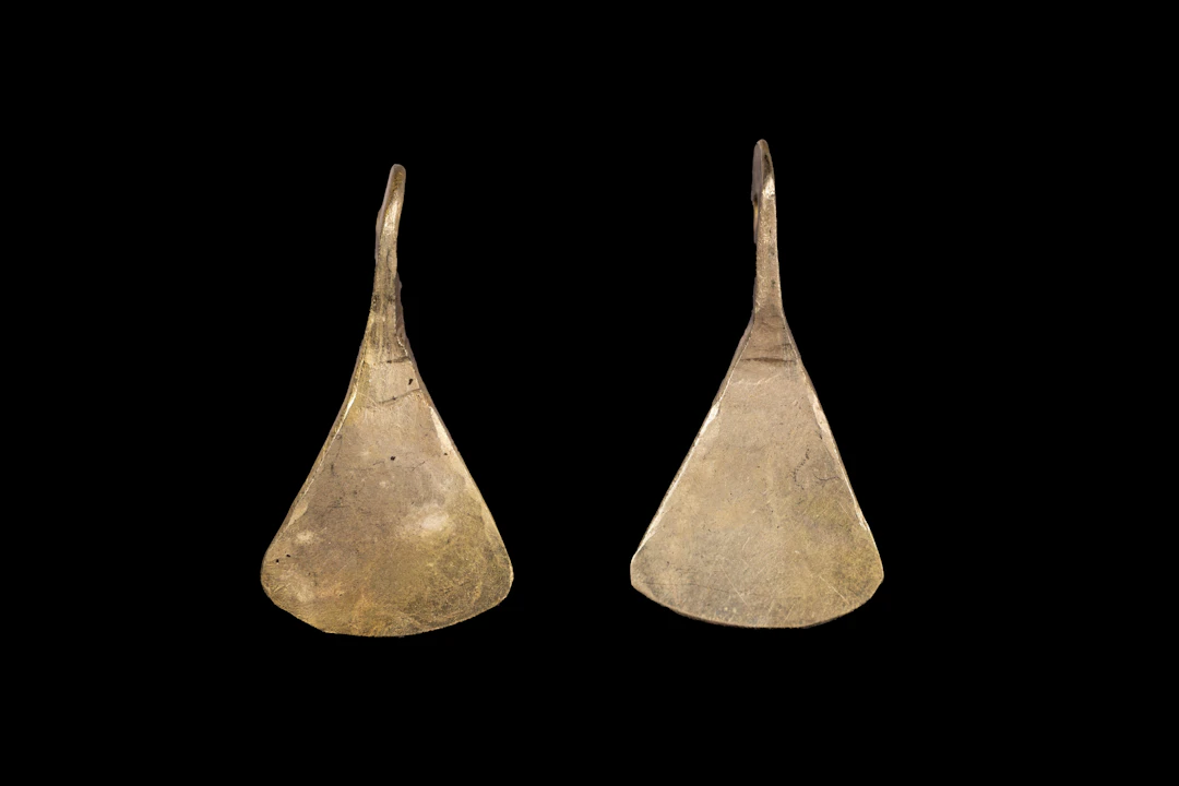 PAIR OF VIKING GOLD AXE PENDANTS