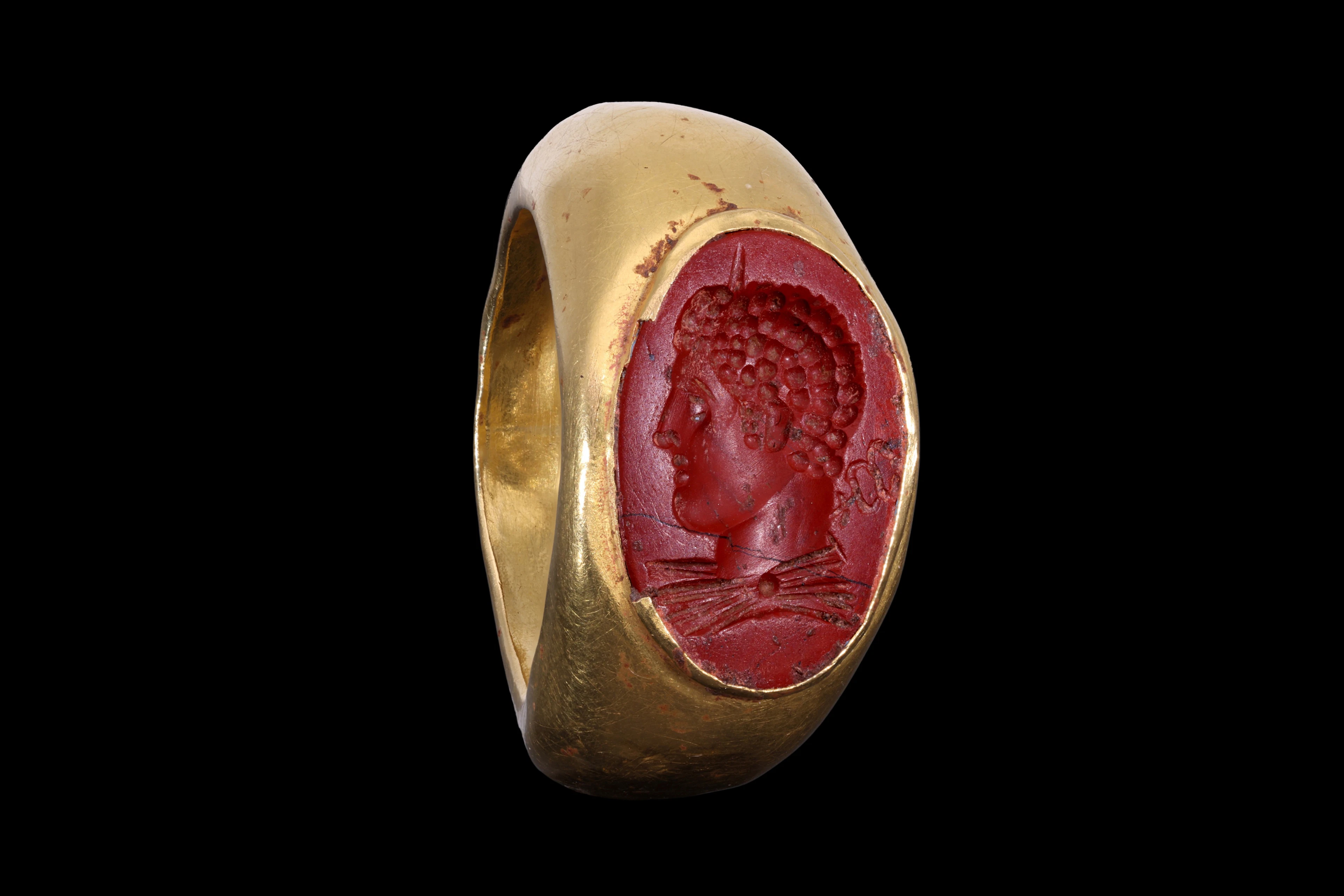 ROMAN GOLD RING WITH RED JASPER INTAGLIO OF A SEVERAN PRINCEPS