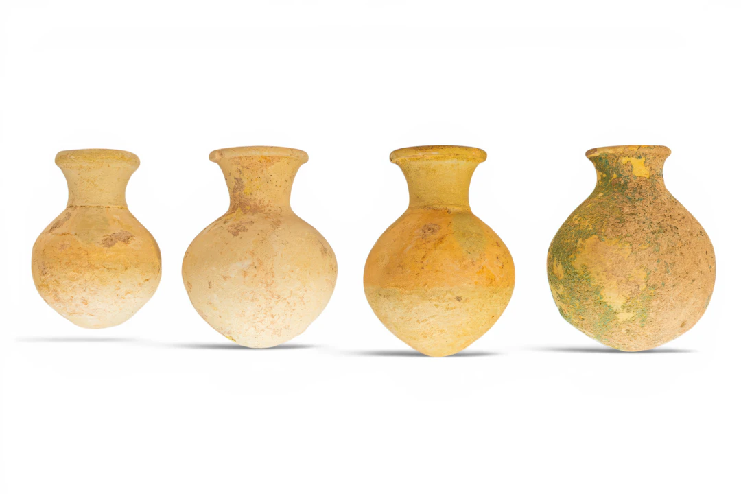 COLLECTION OF NEO-ASSYRIAN GLAZED JARS