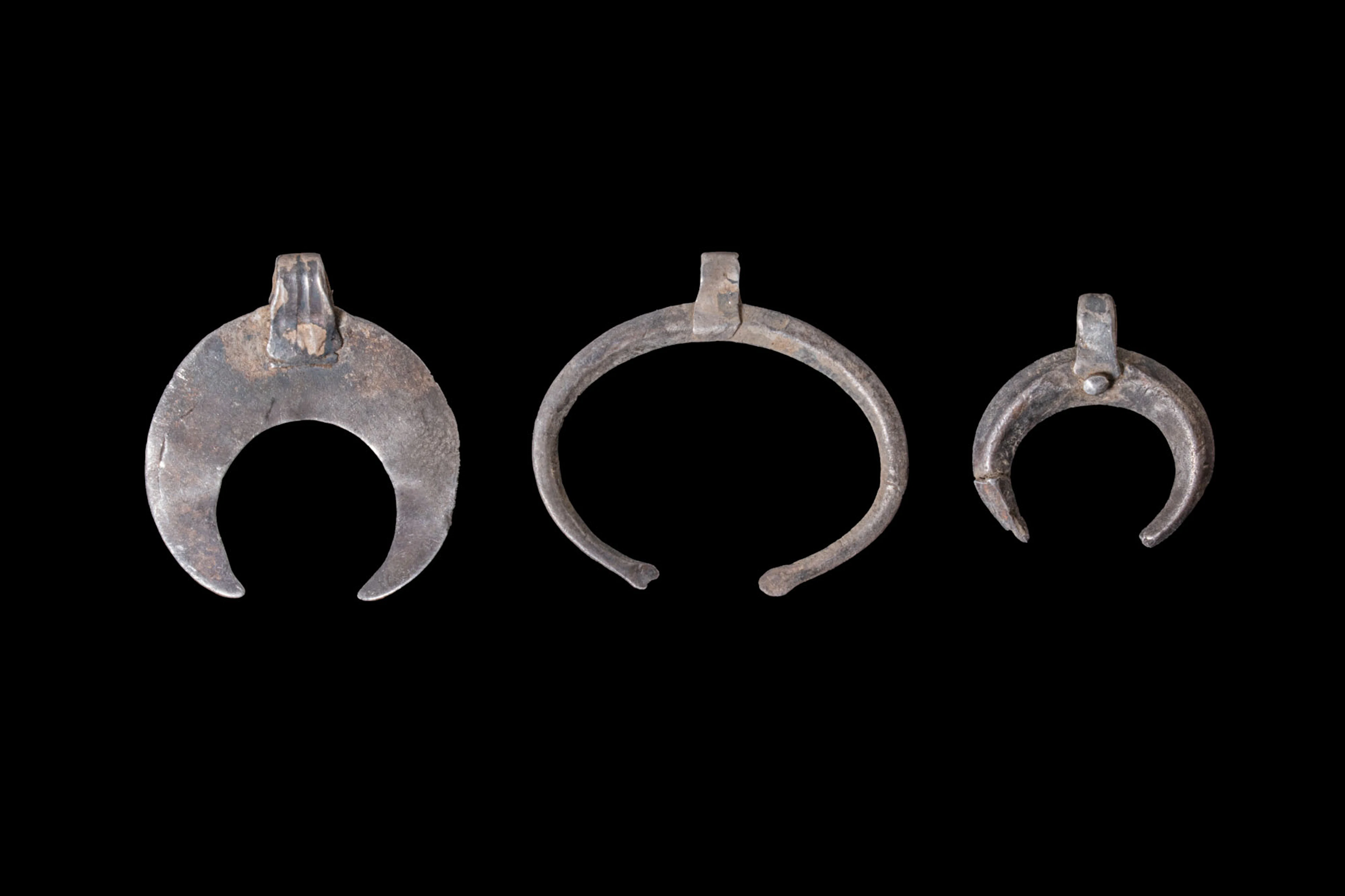 COLLECTION OF GRAECO-ROMAN SILVER LUNULA PENDANTS
