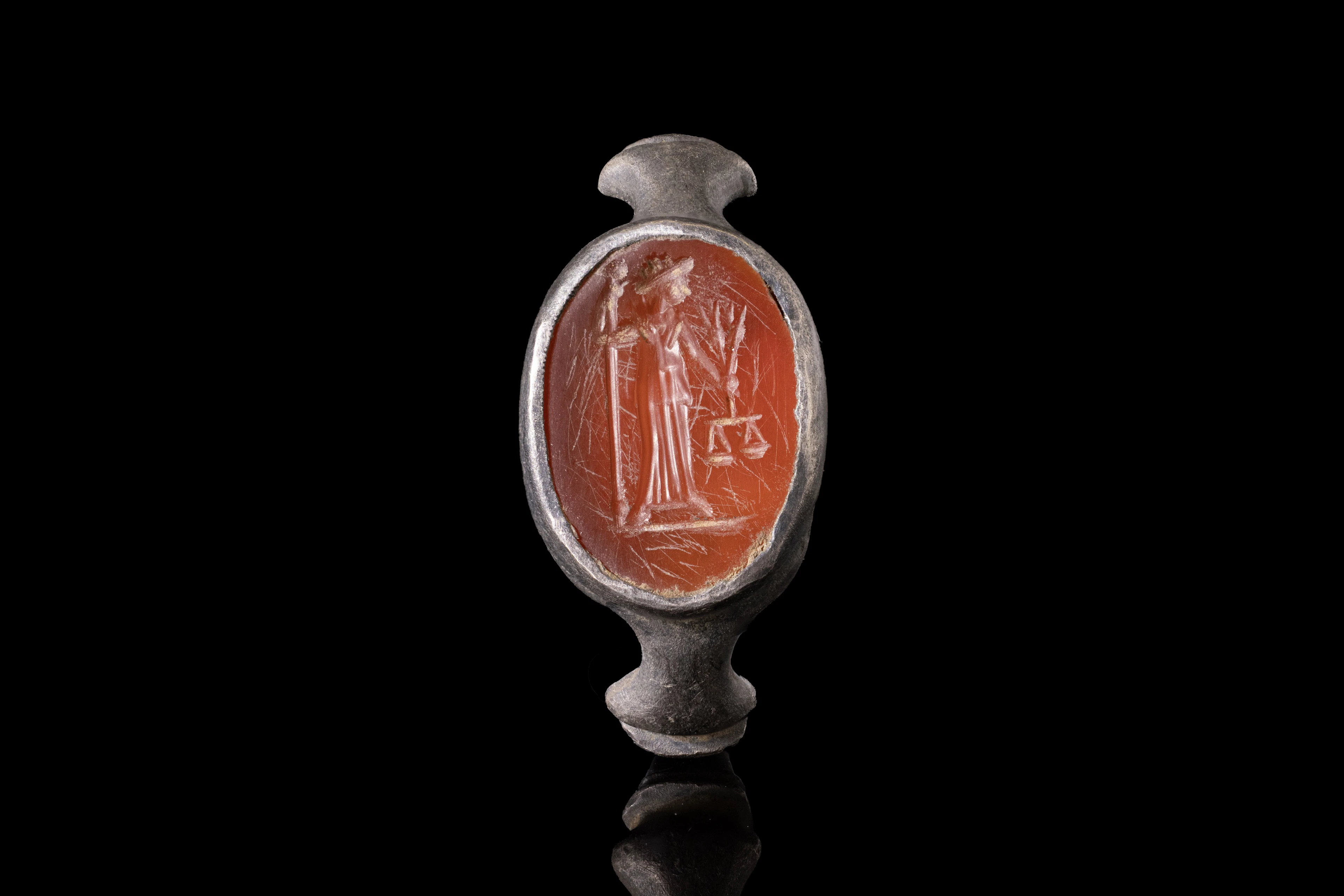 ROMAN CARNELIAN INTAGLIO WITH JUSTITIA HOLDING SCALES IN SILVER RING