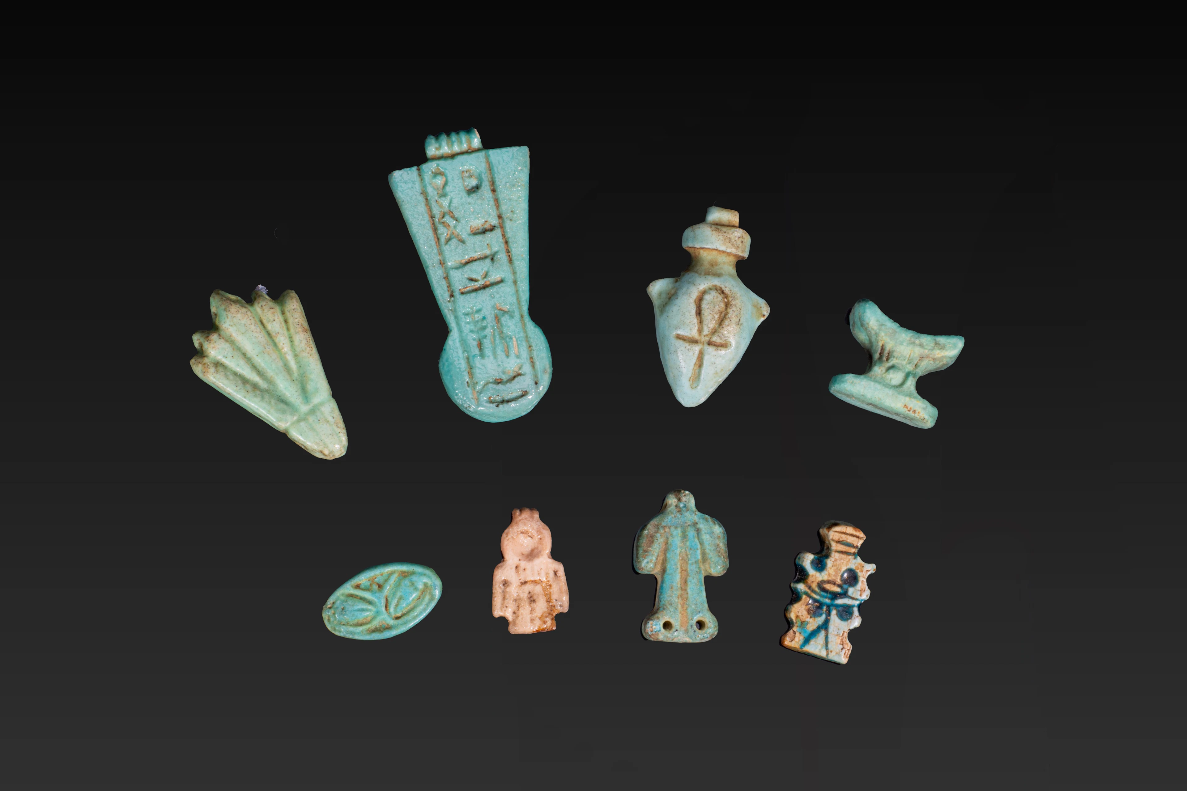 COLLECTION OF EGYPTIAN FAIENCE AMULETS