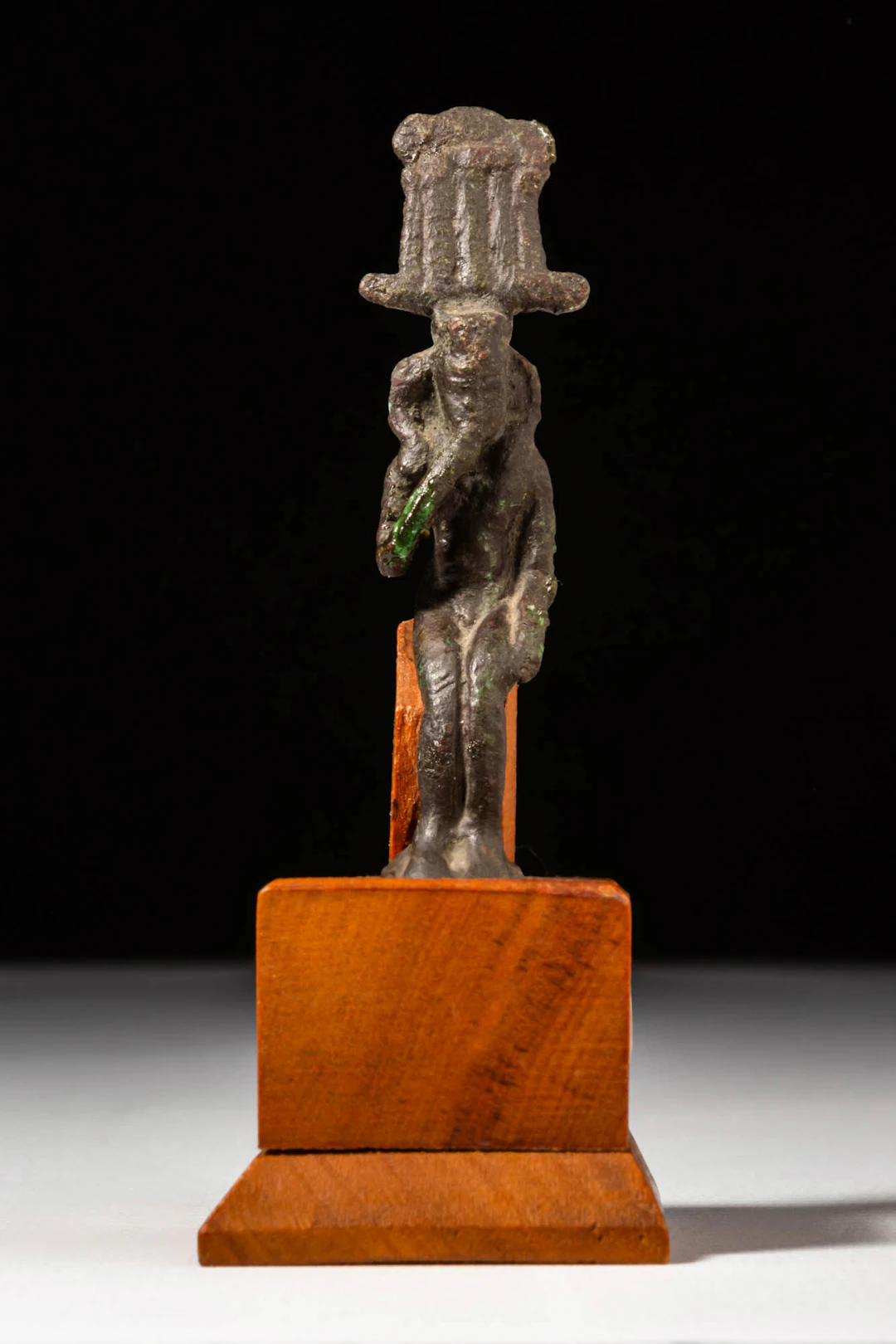 EGYPTIAN BRONZE STATUETTE OF HARPOCRATES