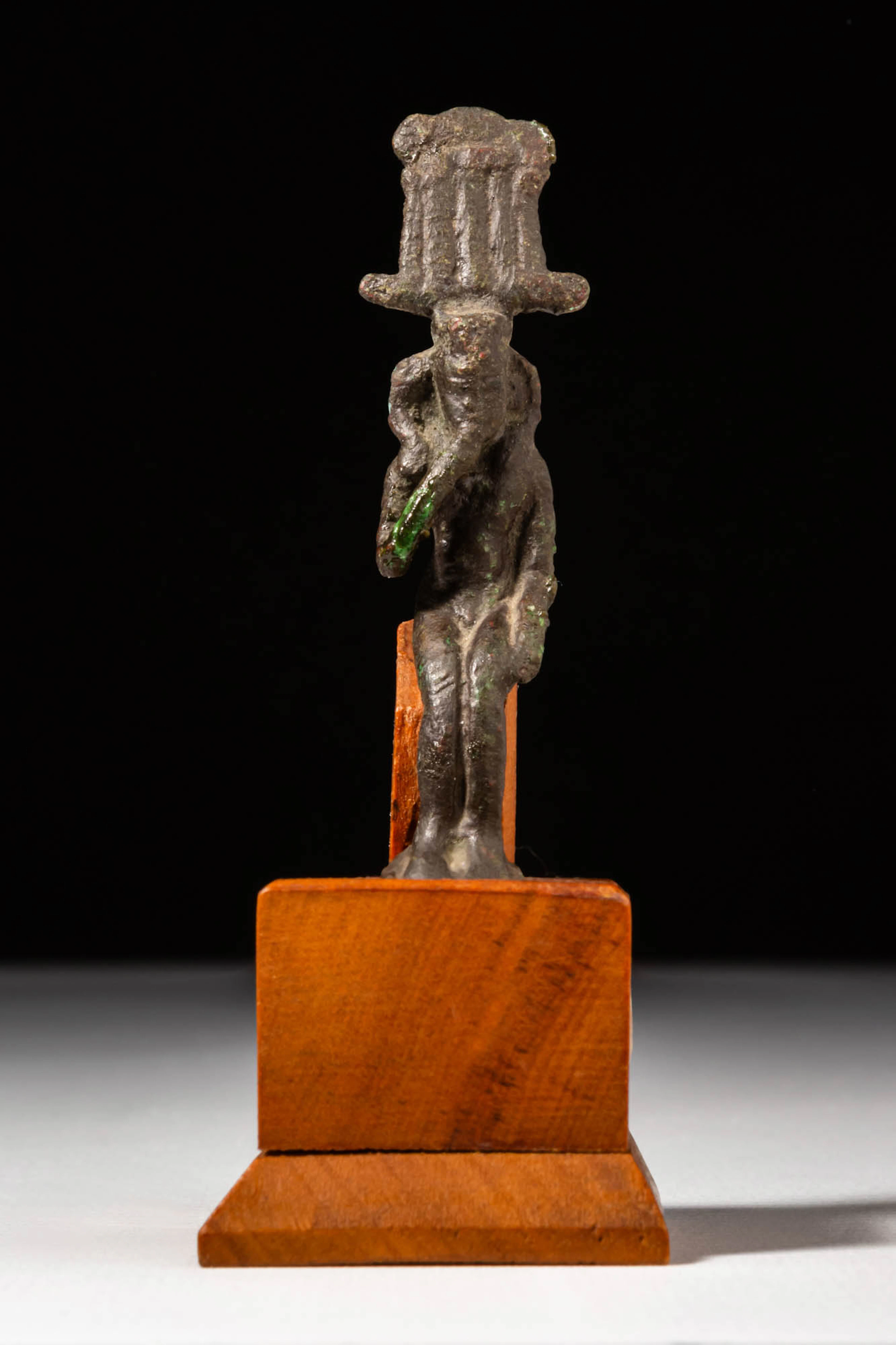 EGYPTIAN BRONZE STATUETTE OF HARPOCRATES