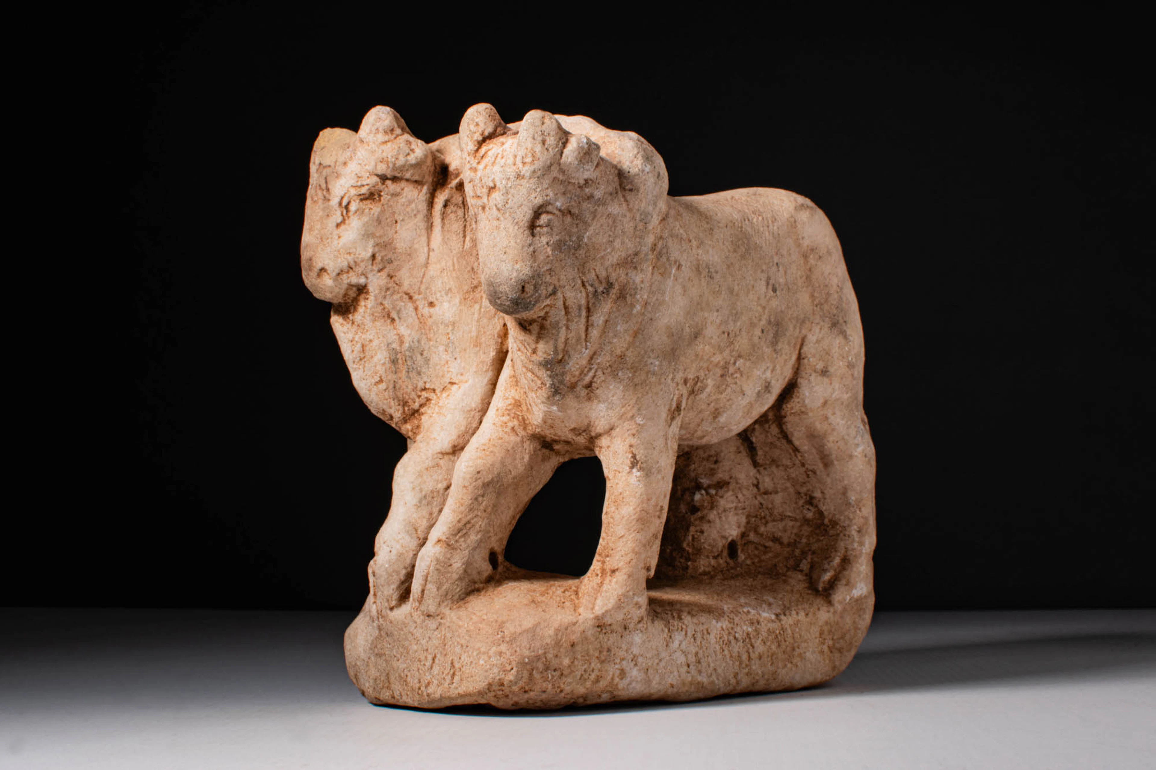 ROMAN MARBLE PAIR OF OXEN HITCHED TO THE CART