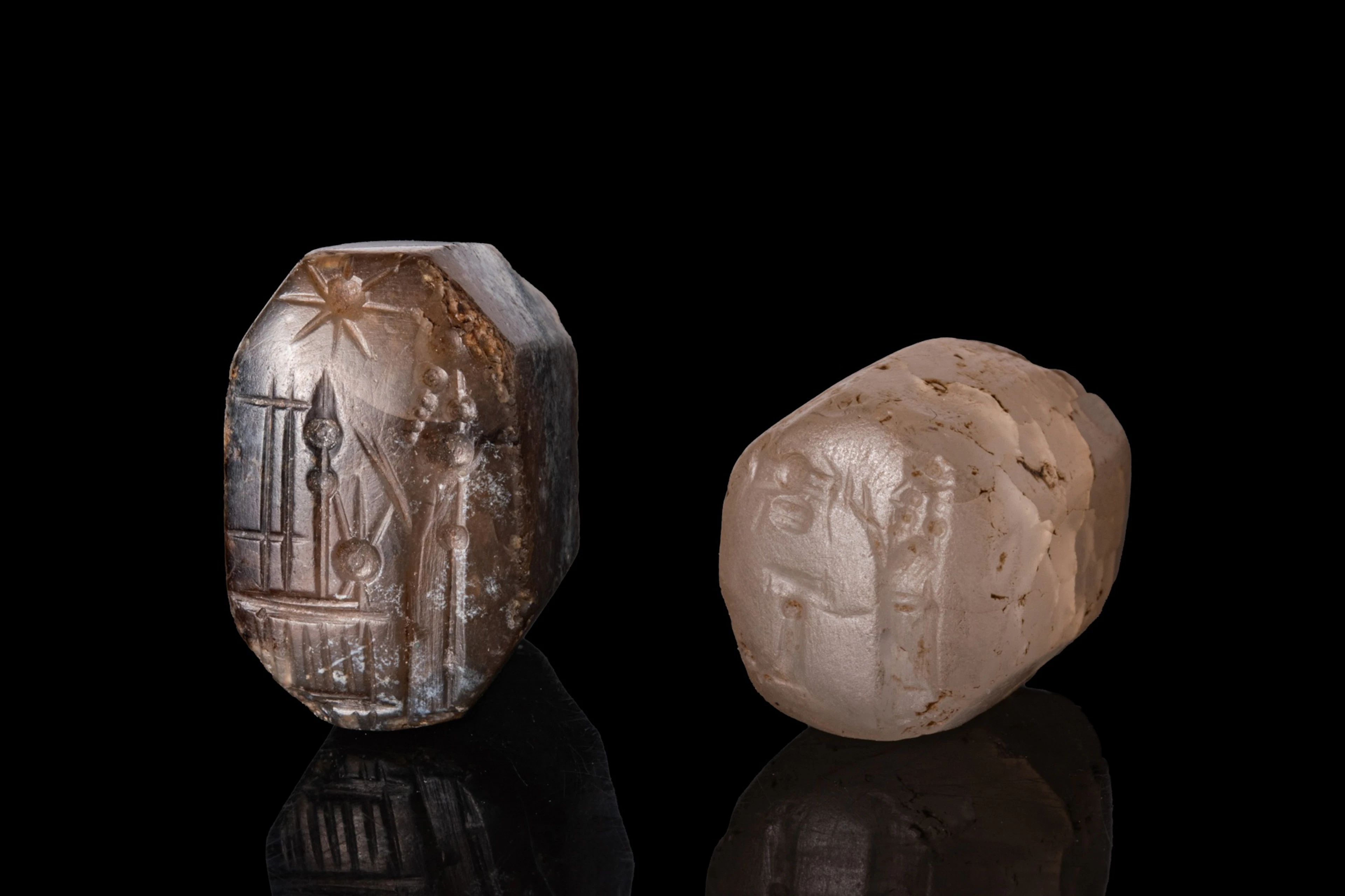 PAIR OF BABYLONIAN STONE SEALS WITH CULTIC SCENES