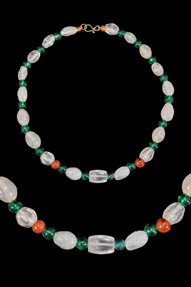 HELLENISTIC ROCK CRYSTAL, GREEN GLASS AND CARNELIAN BEAD NECKLACE