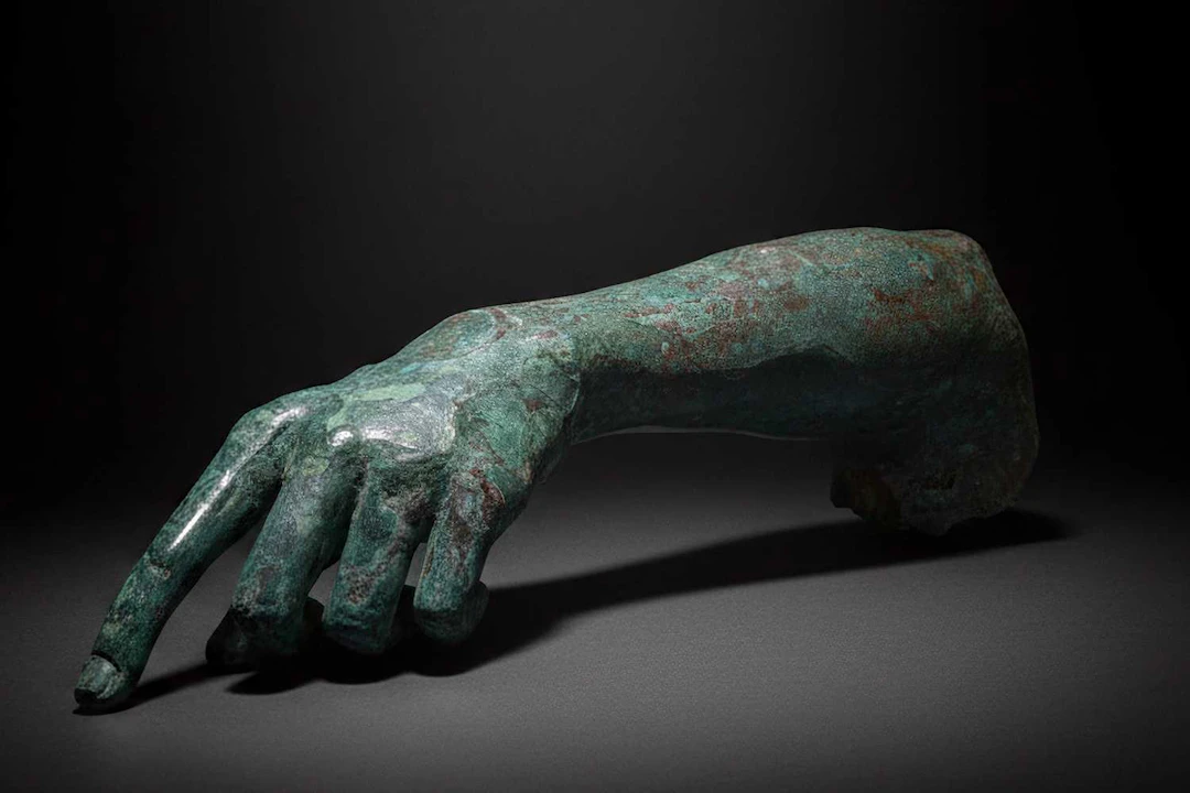 RARE OVERSIZE ROMAN BRONZE ARM FROM A STATUE OF A GOD