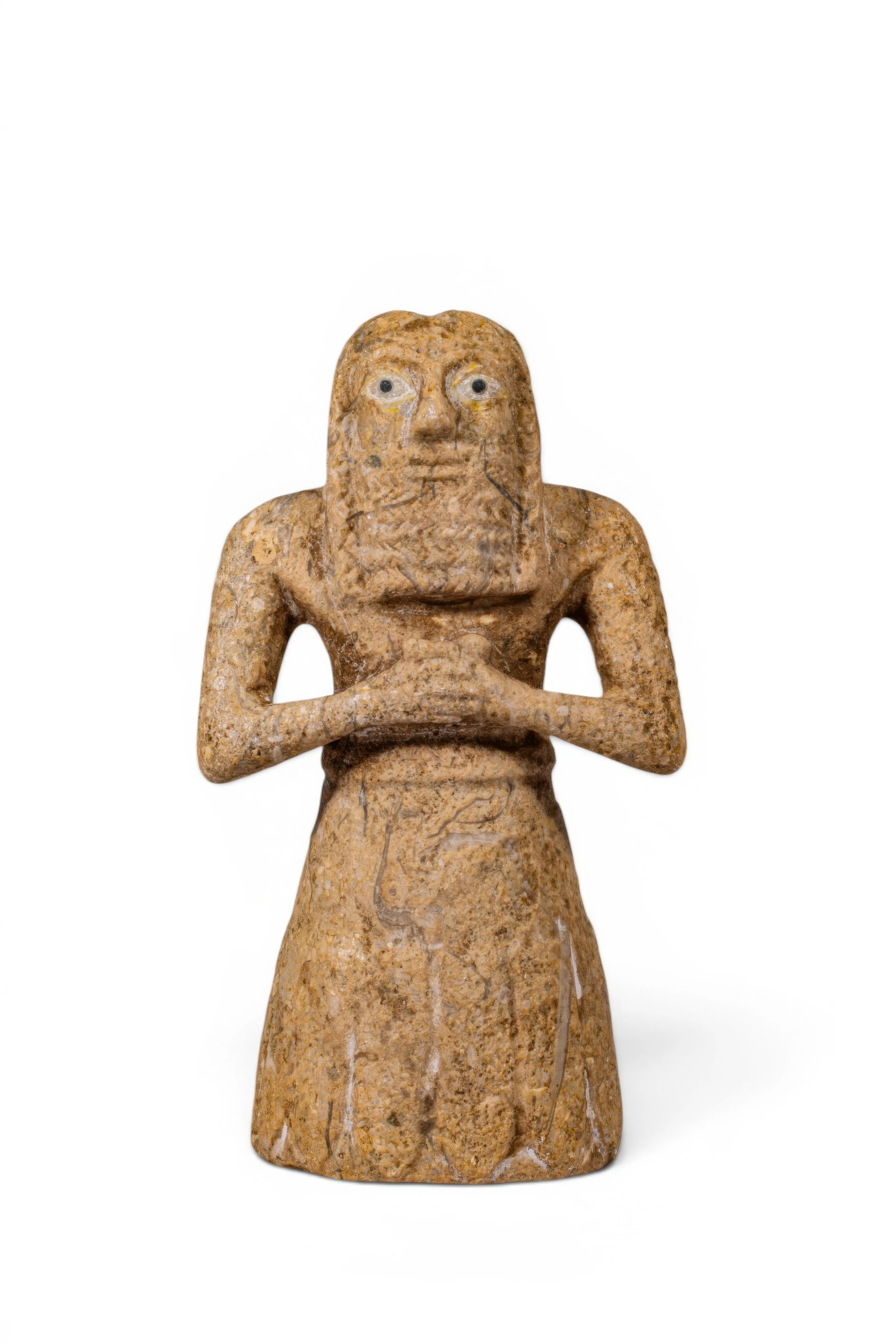 SUMERIAN URUK (OR LATER) STONE STATUE OF A MALE WORSHIPPER WITH INLAID EYES