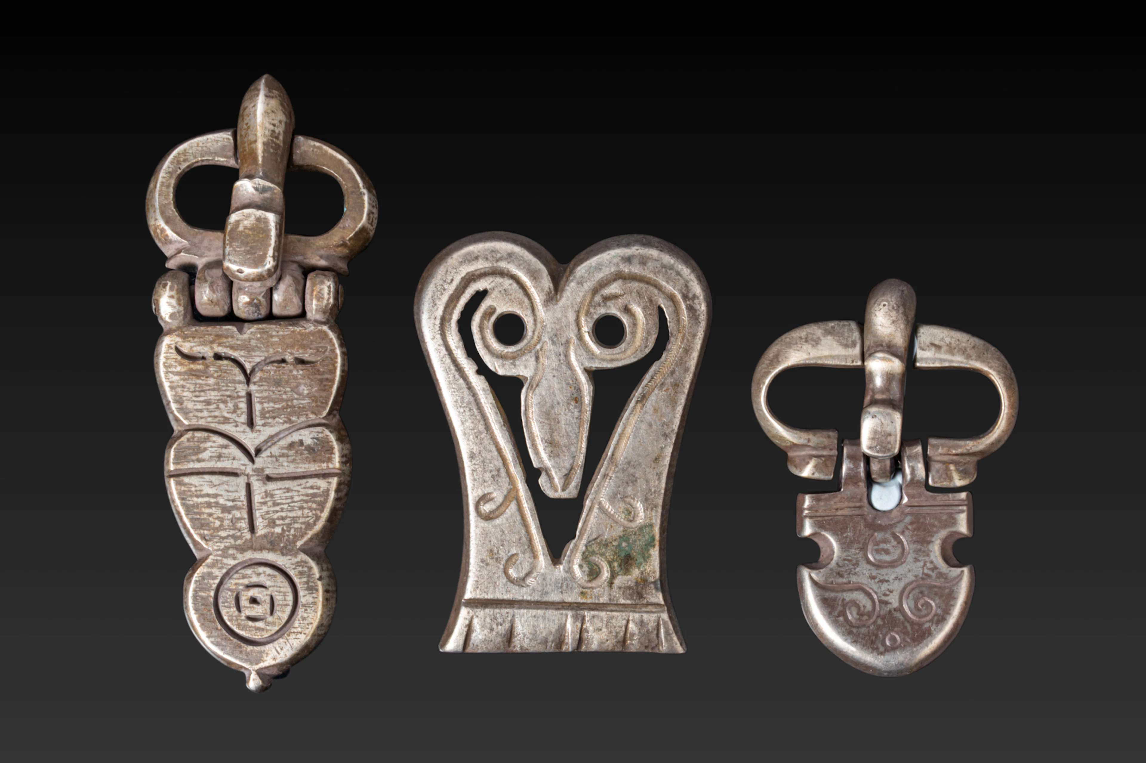 COLLECTION OF BYZANTINE SILVER BELT BUCKLES