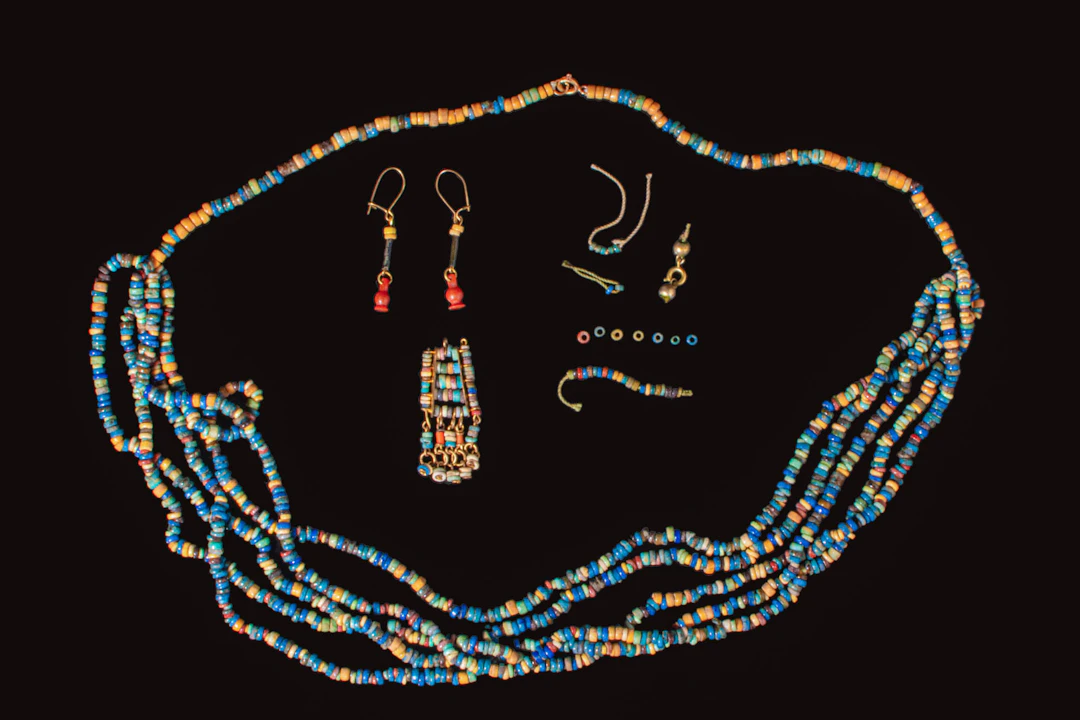 SET OF EGYPTIAN FAIENCE AND CARNELIAN JEWELLERY