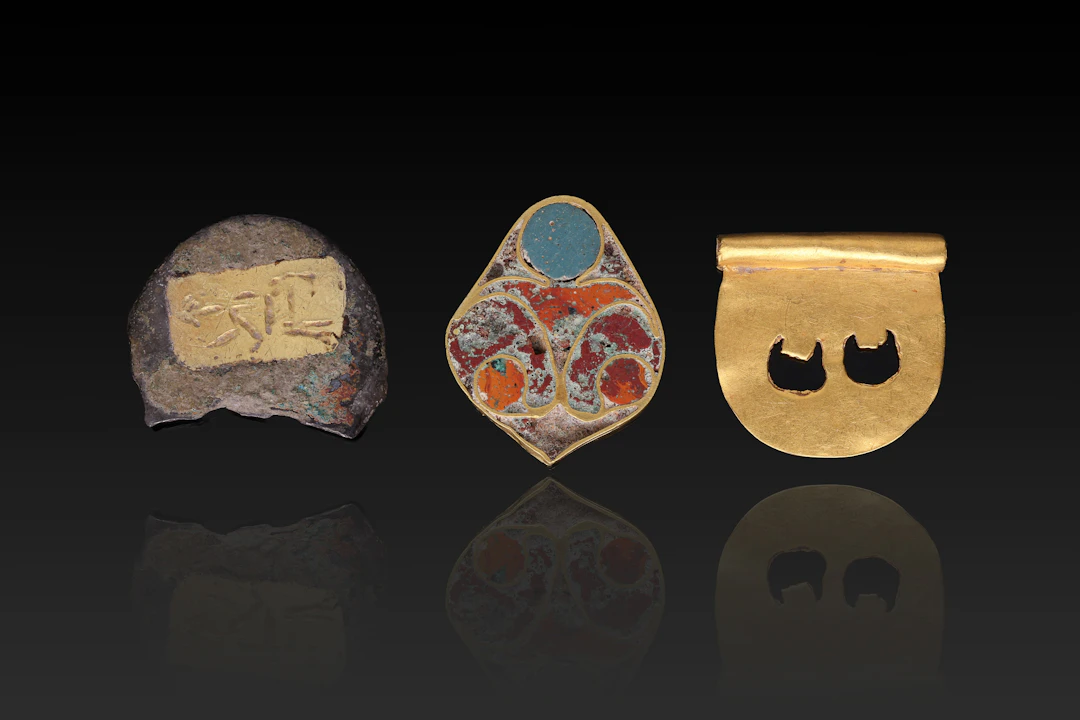 COLLECTION OF EGYPTIAN GOLD, SILVER, BRONZE AND ENAMEL FITTINGS