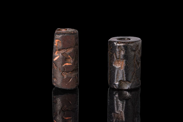 PAIR OF ELAMITE STONE CYLINDER SEALS