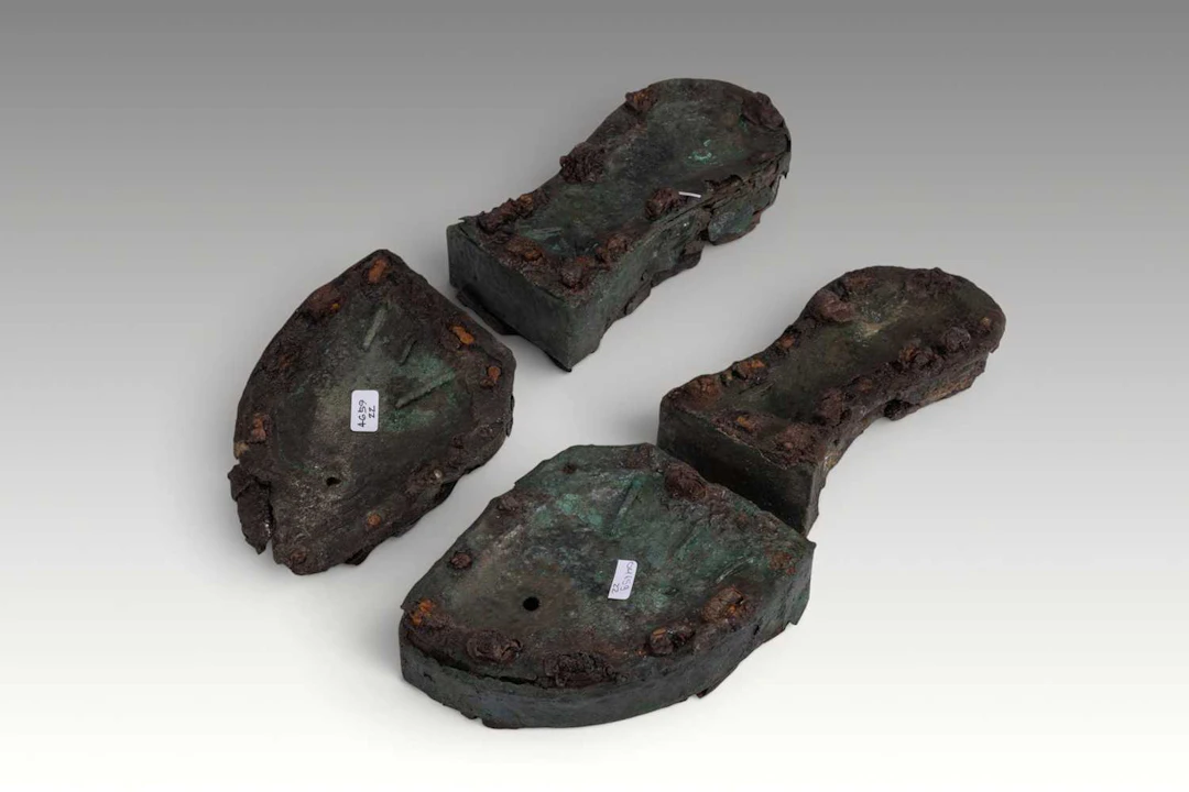 UNIQUE PAIR OF EGYPTIAN BRONZE AND WOOD SANDALS