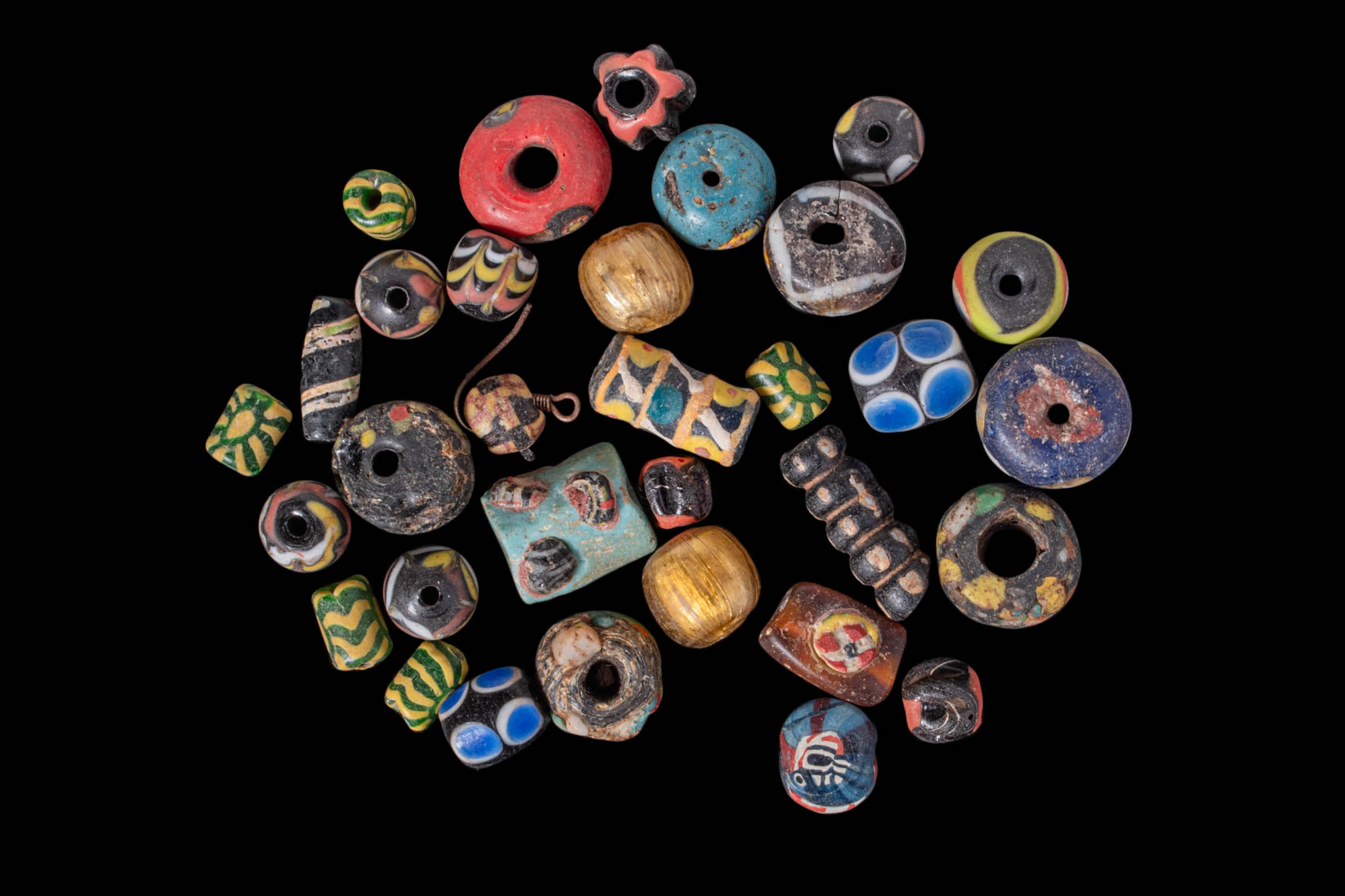 COLLECTION OF HELLENISTIC MOSAIC GLASS BEADS