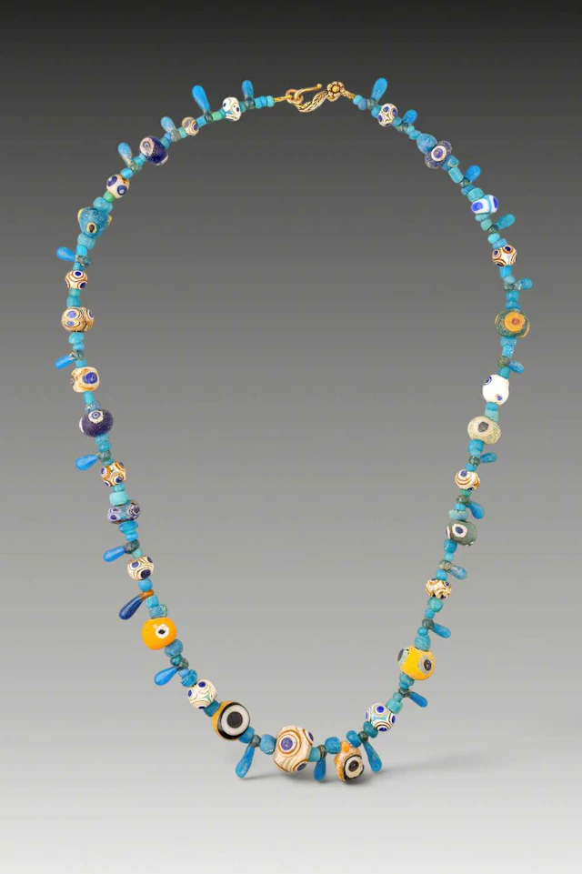 STUNNING LATE GRAECO-PHOENICIAN NECKLACE WITH POLYCHROME GLASS EYE