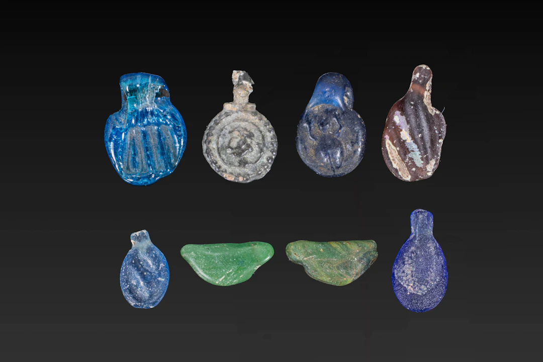 COLLECTION OF ROMAN GLASS PENDANTS