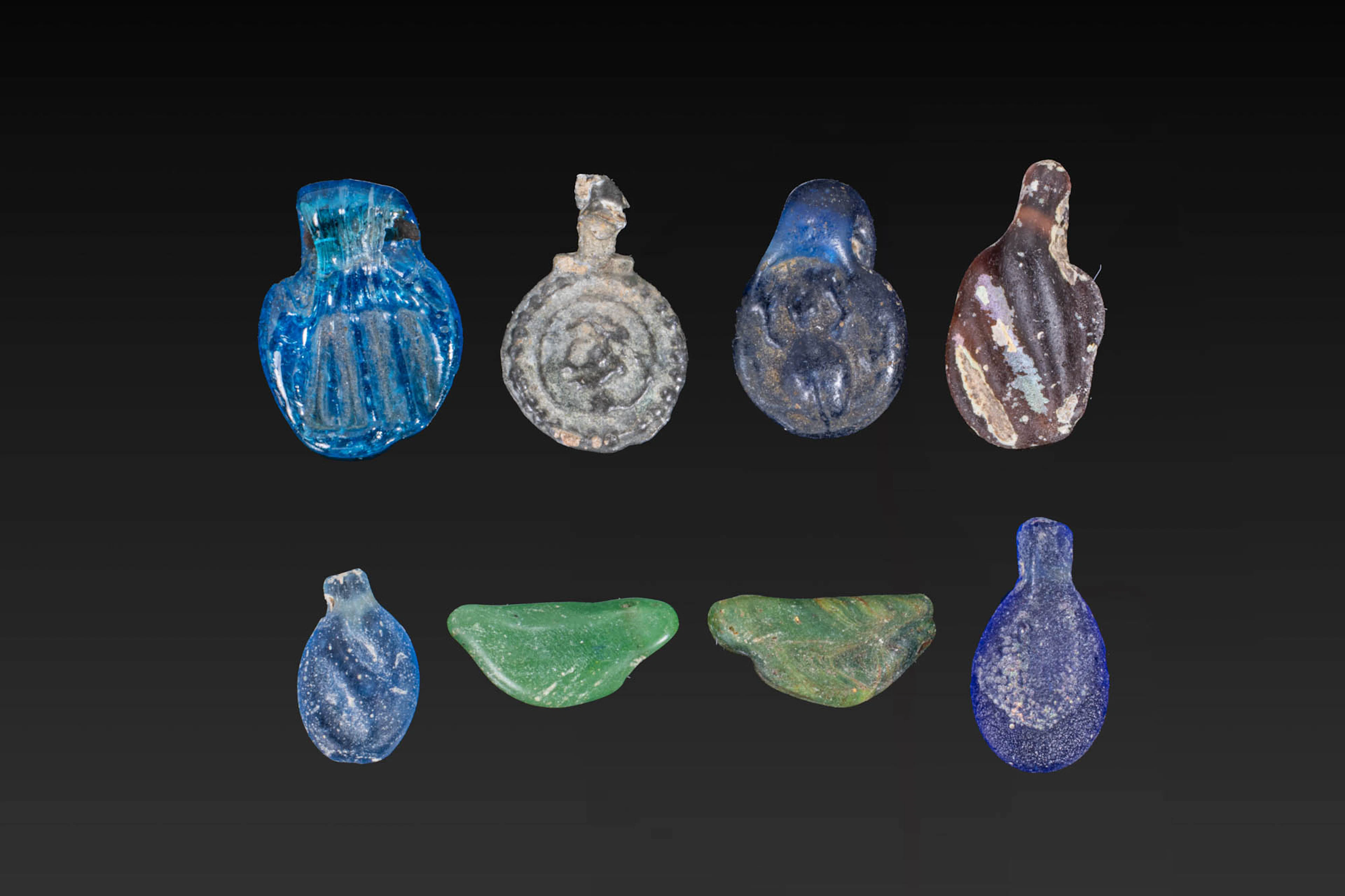 COLLECTION OF ROMAN GLASS PENDANTS