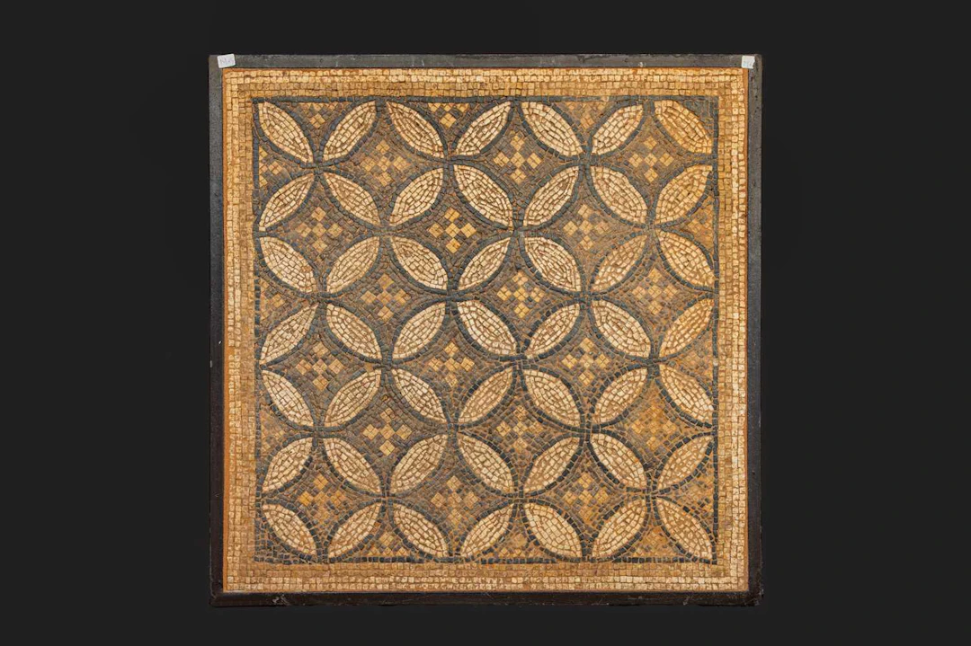 ROMAN MOSAIC PANEL WITH GEOMETRIC MOTIF AND CROSSES