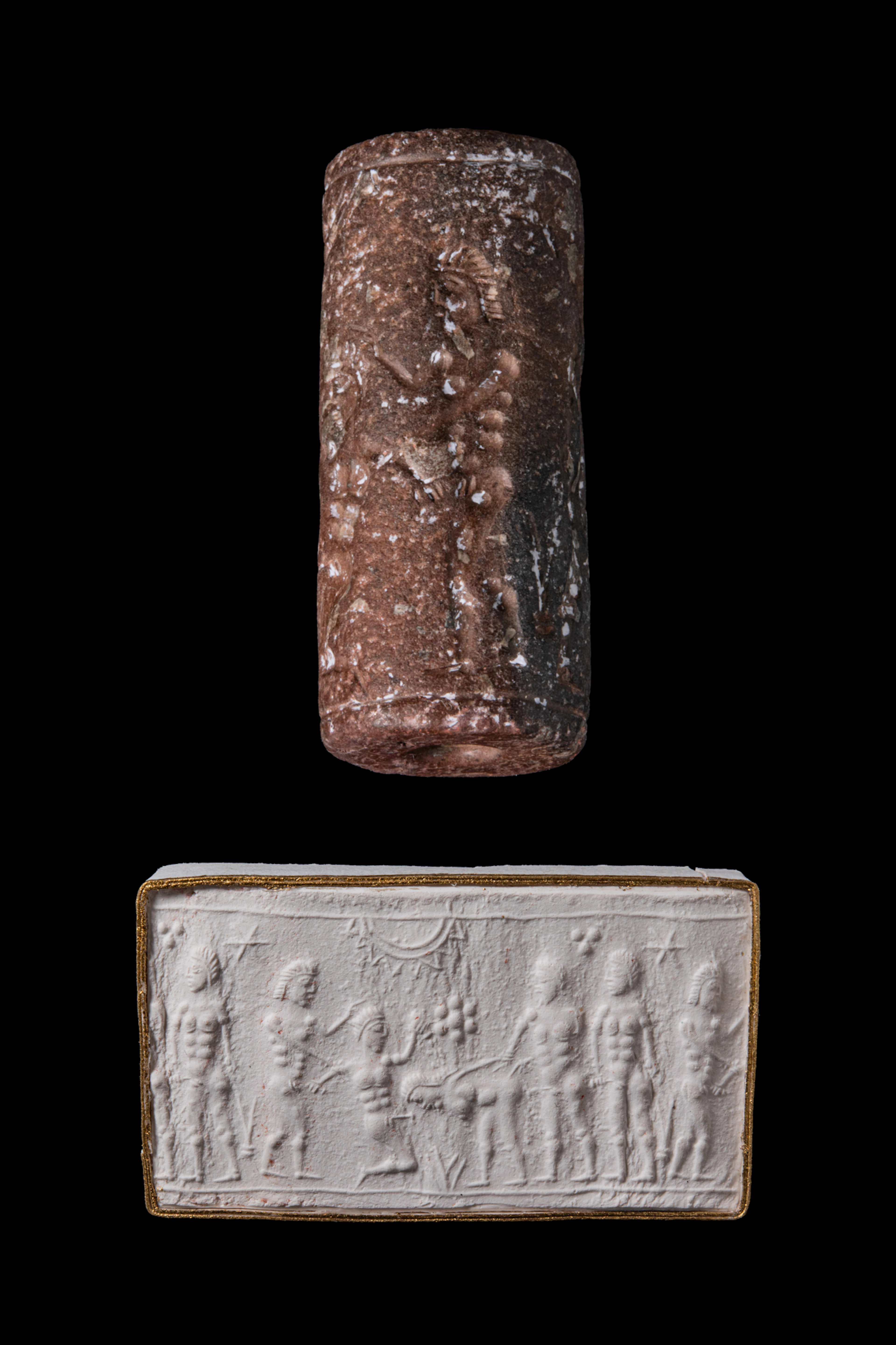 GREEK PERIOD SPOTTED BROWN STONE CYLINDER SEAL WITH EROTIC SCENE