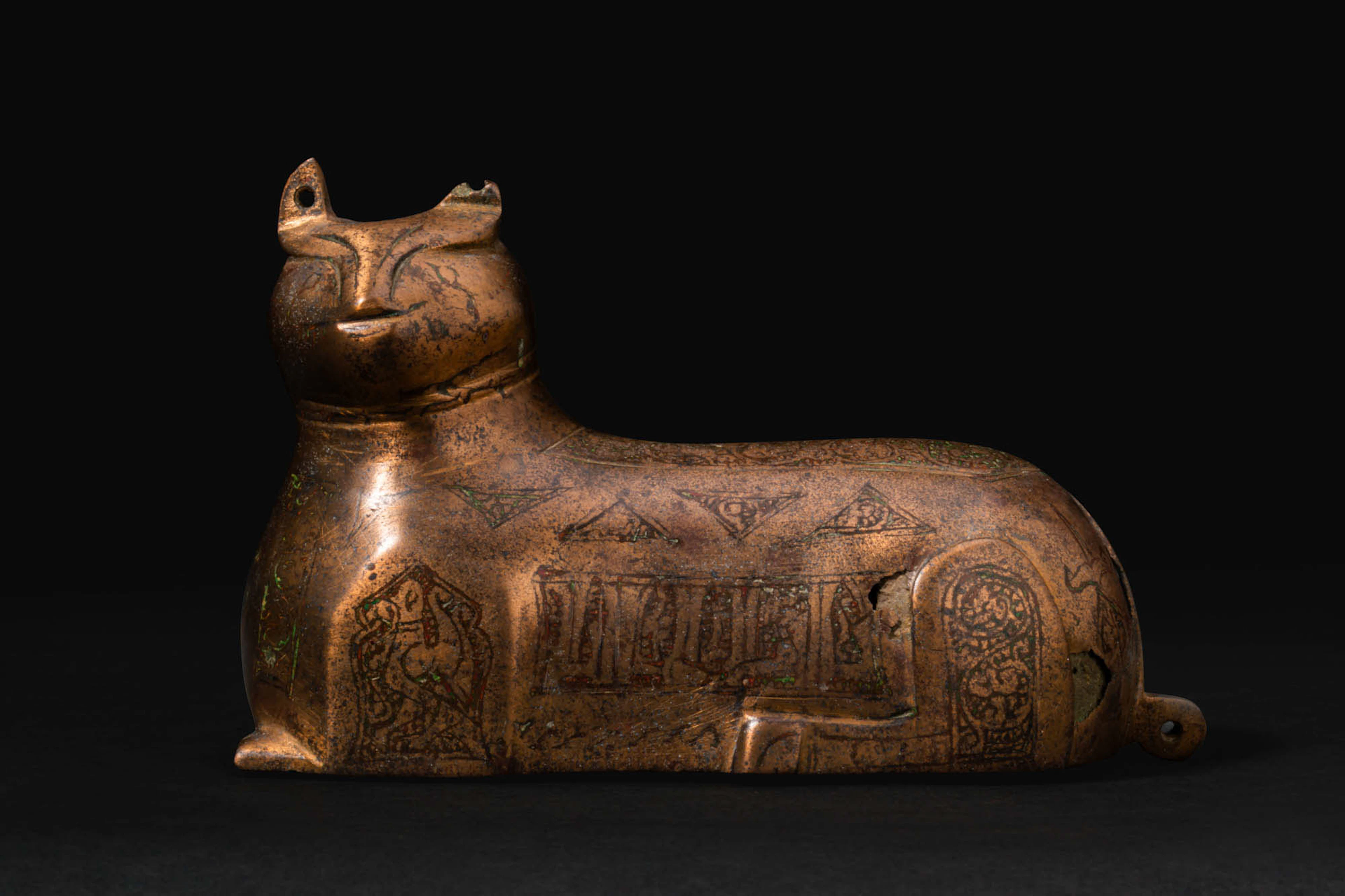 SELJUK INLAID BRASS LION WEIGHT FOR CARPET WITH INSCRIPTIONS