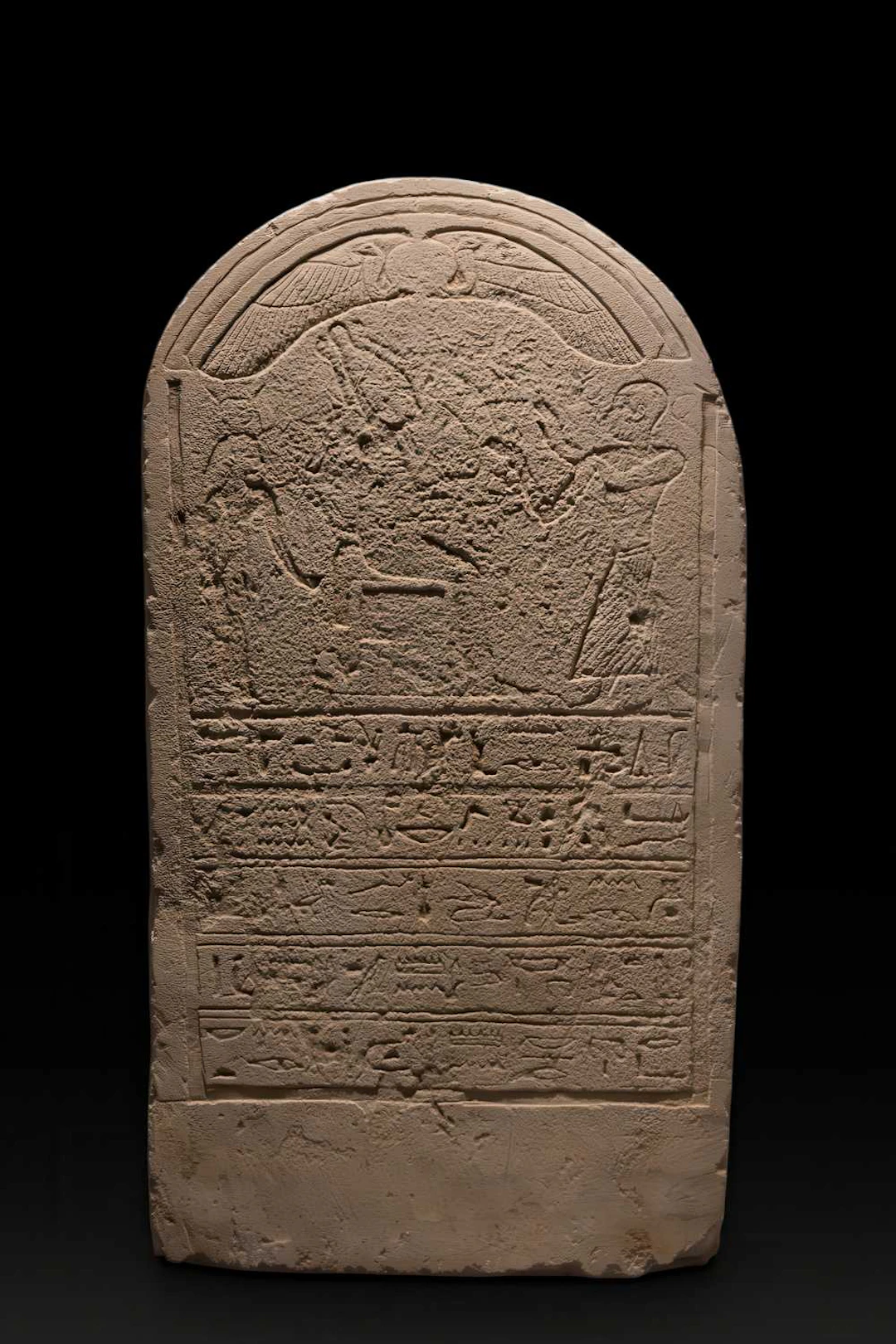 STUNNING EGYPTIAN LIMESTONE STELE DEPICTING ISIS, OSIRIS, A DECEASED