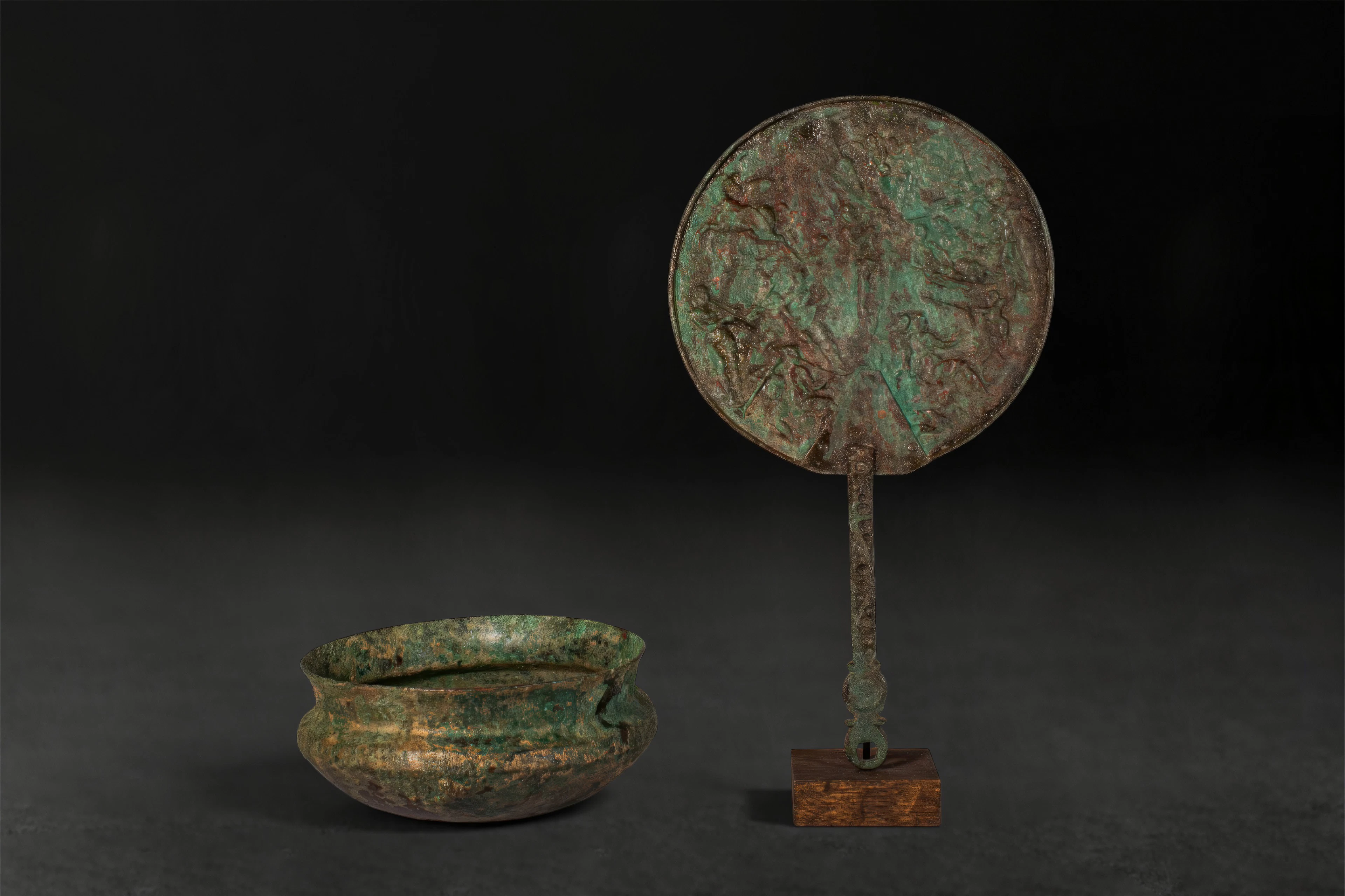 ETRUSCAN LARGE BRONZE MIRROR WITH MUSICIANS AND A BRONZE BOWL