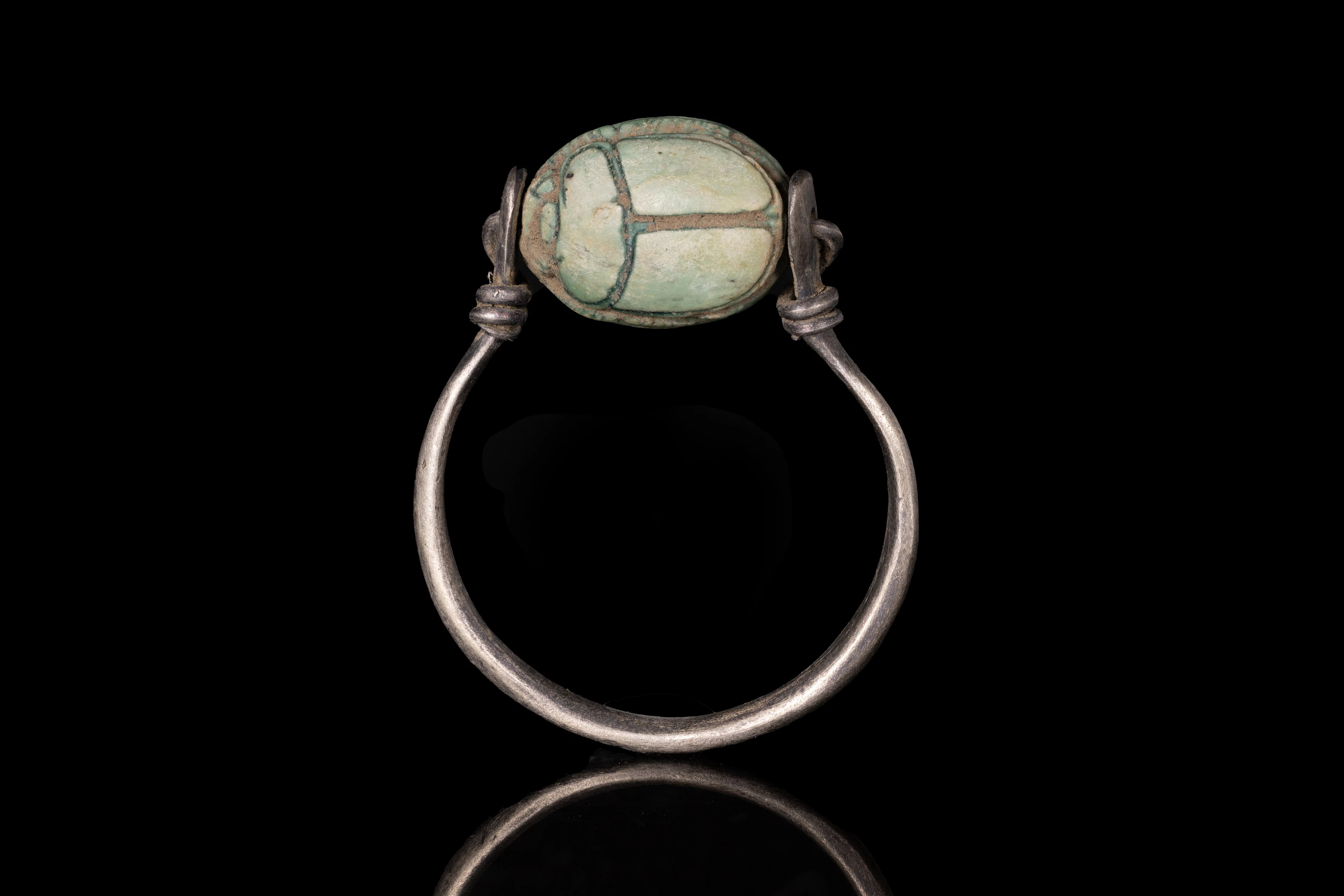 EGYPTIAN GLAZED STEATITE SCARAB WITH WINGED LION IN SILVER RING