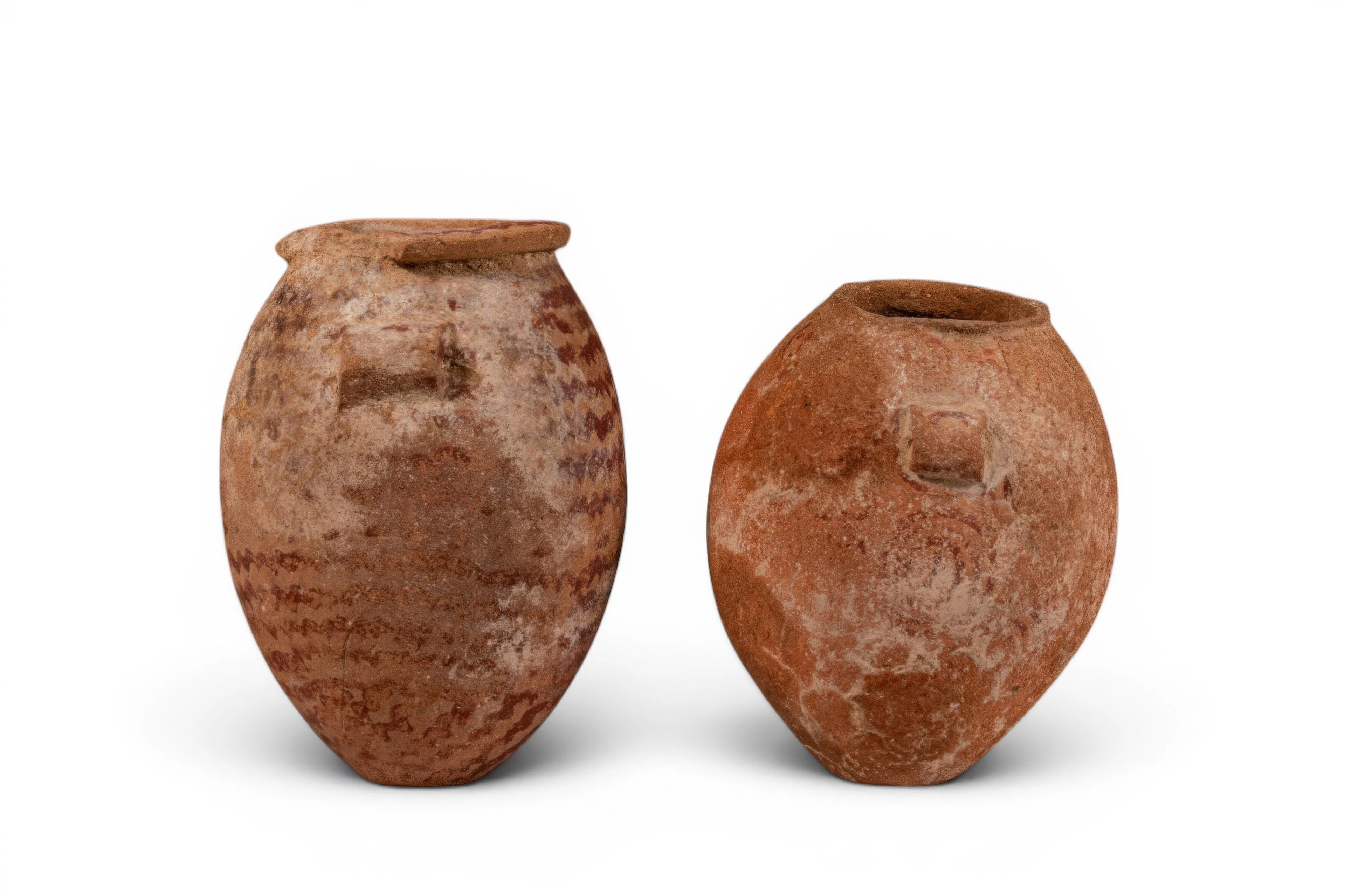 PAIR OF EGYPTIAN PREDYNASTIC TERRACOTTA JARS WITH RED ENGOBE GEOMETRIC MOTIFS