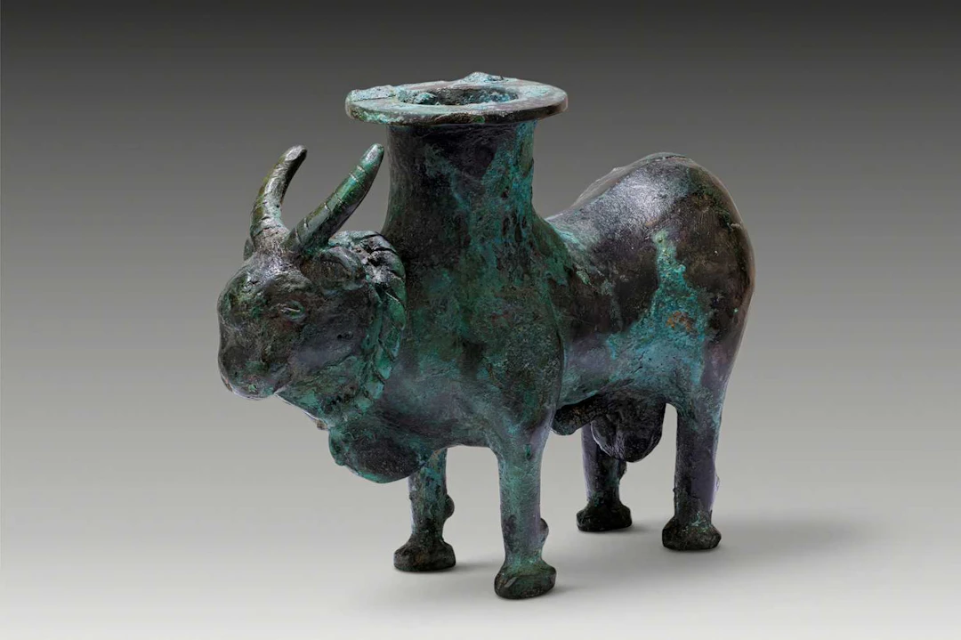 LATE ELAMITE BRONZE FIGURAL VESSEL IN THE FORM OF A BULL