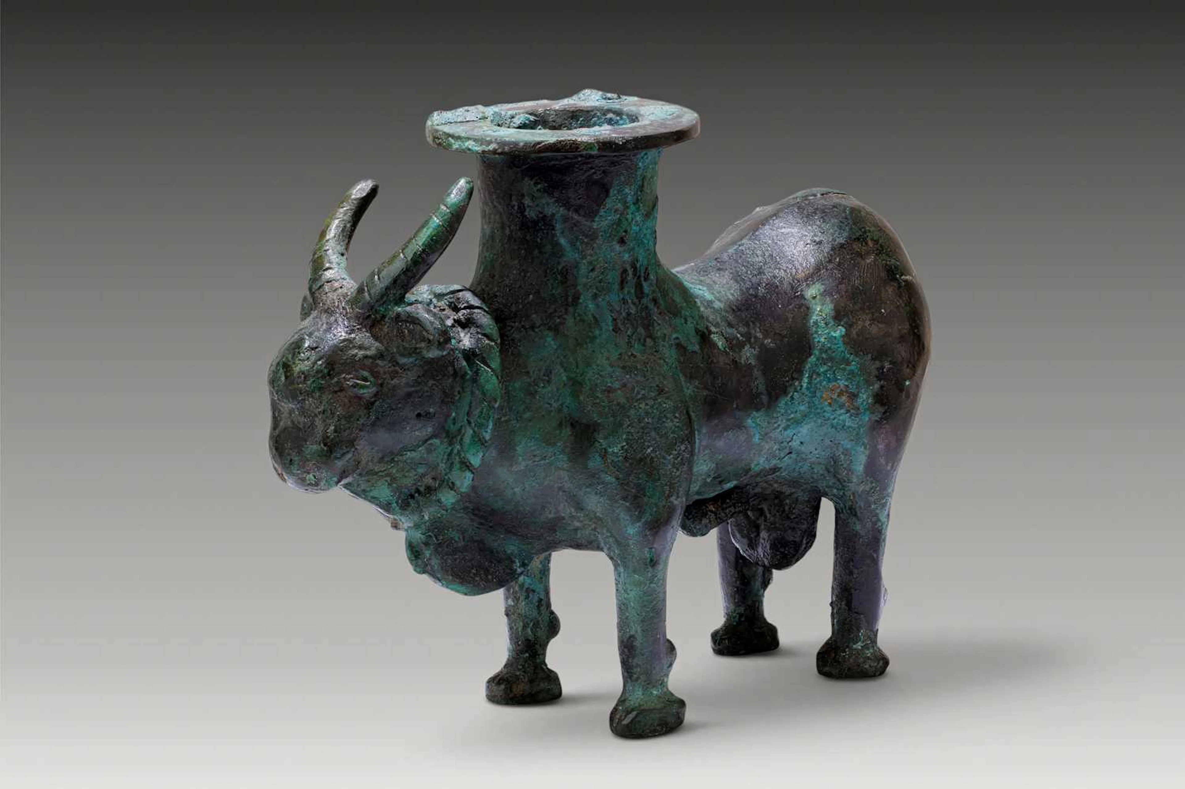 LATE ELAMITE BRONZE FIGURAL VESSEL IN THE FORM OF A BULL