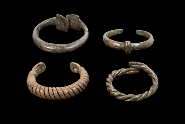 COLLECTION OF CELTIC BRONZE BANGLES