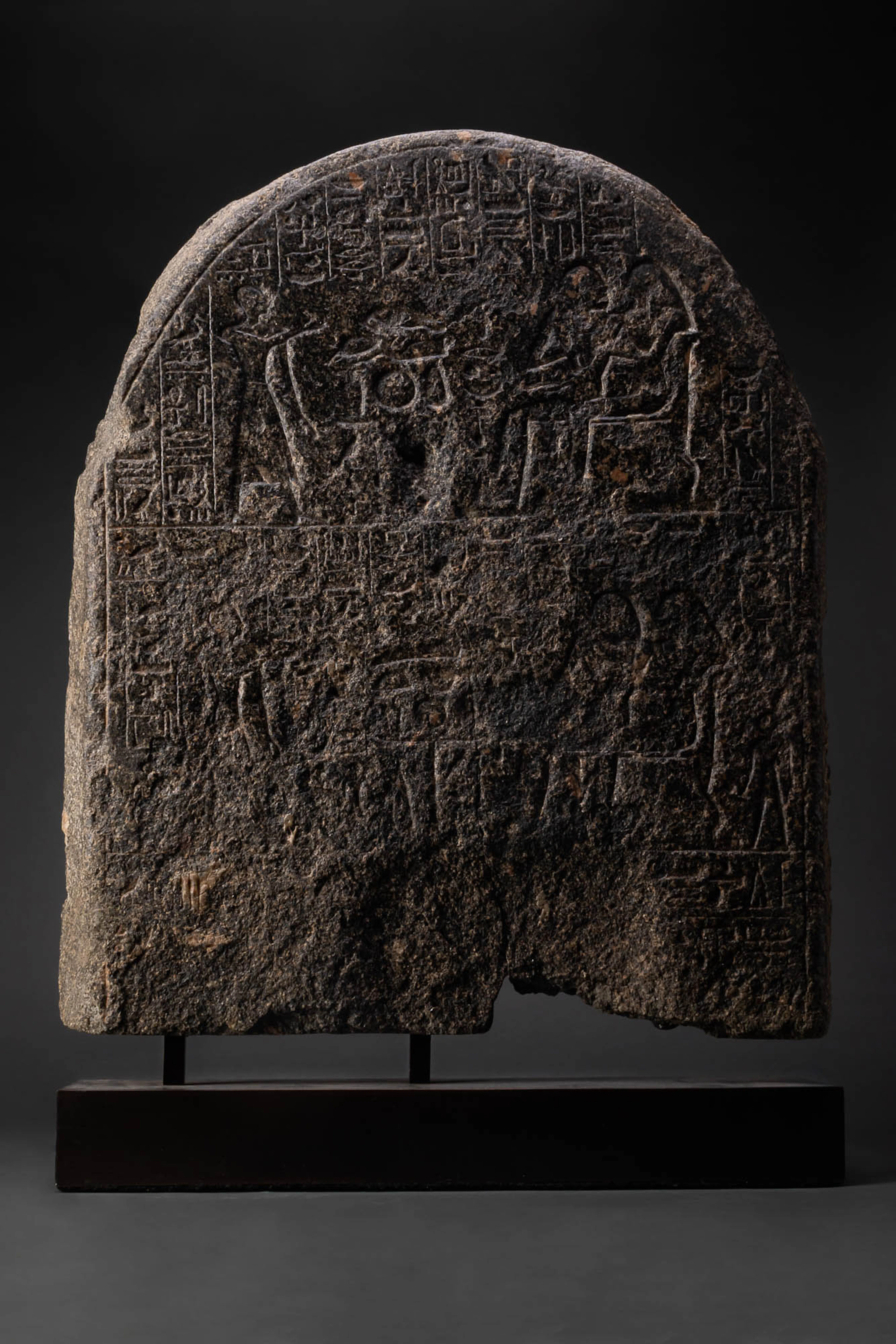 LARGE EGYPTIAN GRANITE FUNERARY STELA OF THE LECTOR-PRIEST BAKY AND