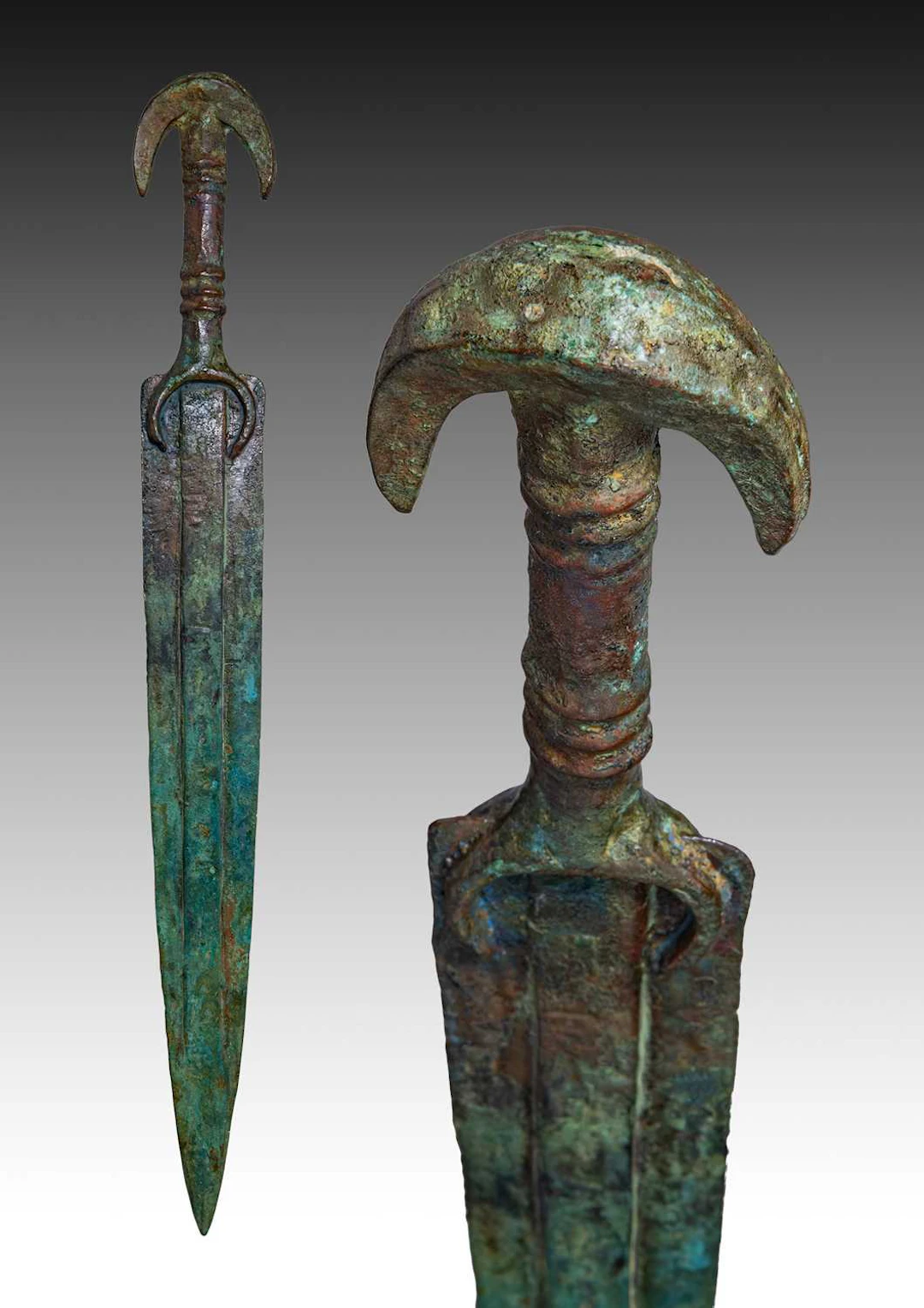 LATE BRONZE AGE BRONZE SWORD WITH CRESCENT POMMEL
