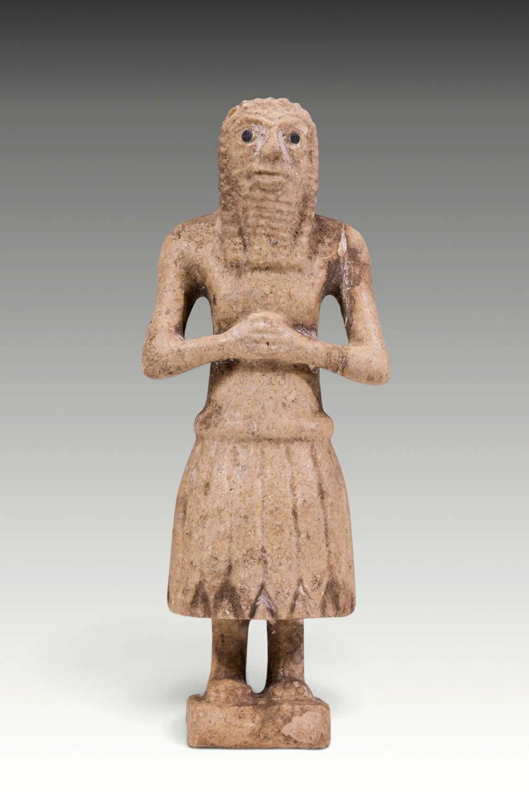 SUMERIAN MARBLE FIGURINE OF PRIEST WITH INLAID EYES
